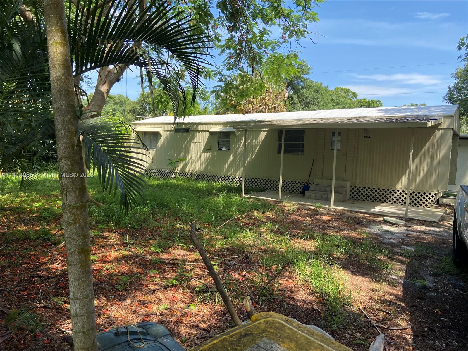 Sparkling 2-bedroom home! Features new flooring and paint inside and out. Newer kitchen and bath, large windows. Nice size yard. 8 x 10 storage shed with hookups for washer and dryer. All located and a quiet residential street, but close to everything.