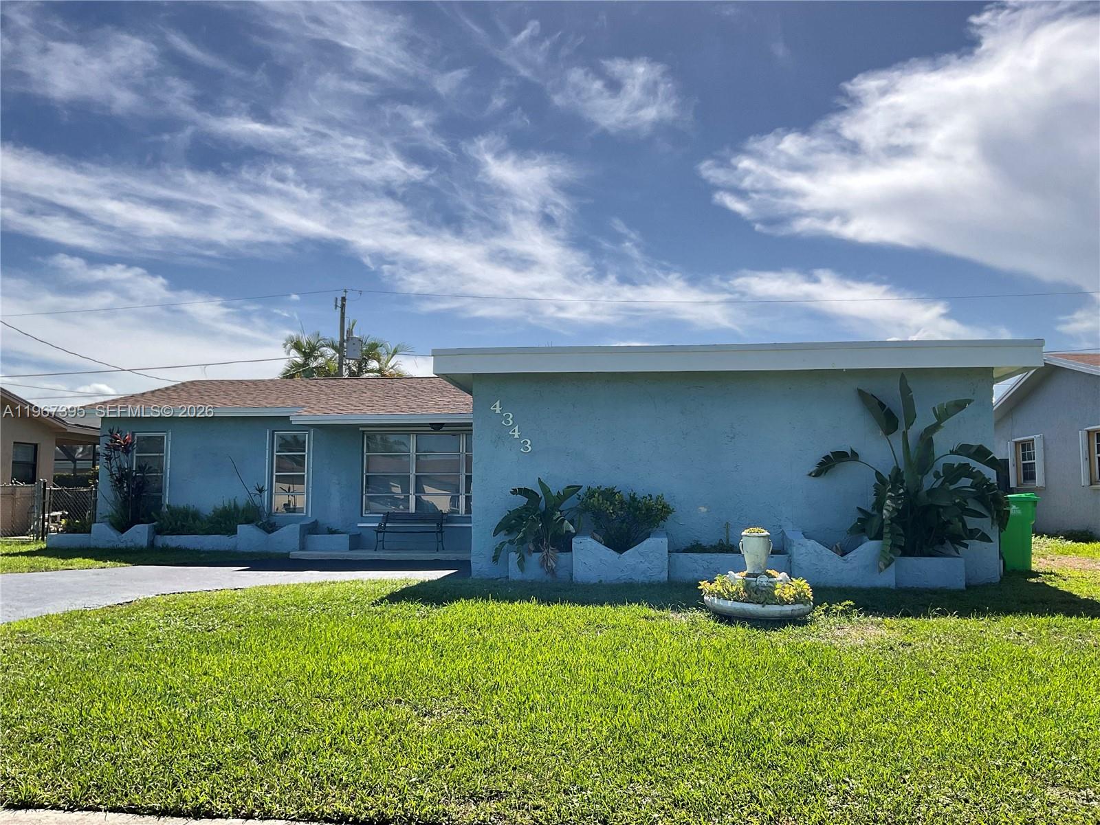 No HOA! No association approval needed. One story single family home in West Sunrise, 3 bedrooms 2 baths. Tile floors in the main area and vinyl in the bedrooms. Impacts windows throughout. Screen enclosure in the back, that leads to a large fenced yard and above ground pool. Spacious living room with separate family room. Nicely equipped kitchen with separate eat in area. One car garage, full a size washer/dryer and large driveway. Pets Ok.