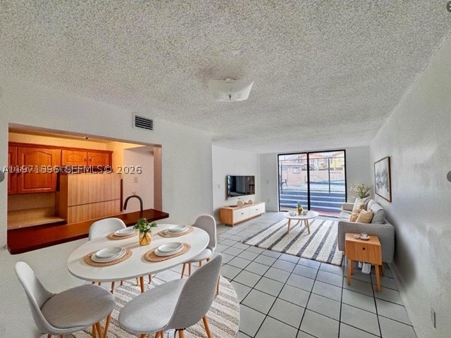 Great corner unit on the first floor, ideal for end-users or investors, 2 bedrooms, 2 bathrooms, laundry facilities. The refrigerator is going to be replaced. Excellent location near Palmetto, Turnpike, and 836 Expressway. ONLY 1 ASSIGNED PARKING SPACE. NO ADDITIONAL PARKING AVAILABLE.