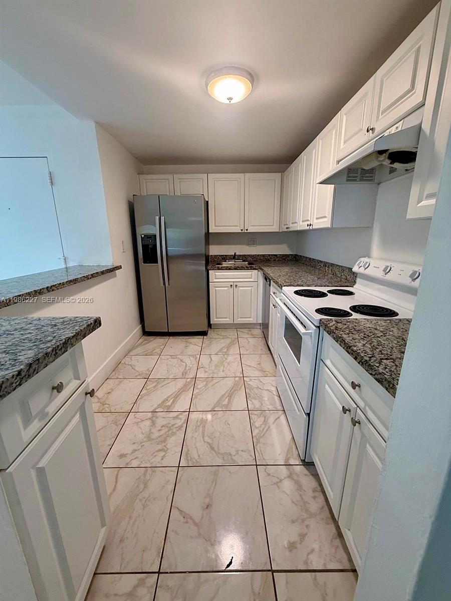 Spacious 2-bed, 2-bath condo in Kendall Acres featuring a functional layout, large bedrooms, and great flooring throughout. Enjoy a private balcony and a kitchen with a brand-new refrigerator. Laundry facilities on the first floor and 1 assigned parking space included. Great investment opportunity with strong rental potential.