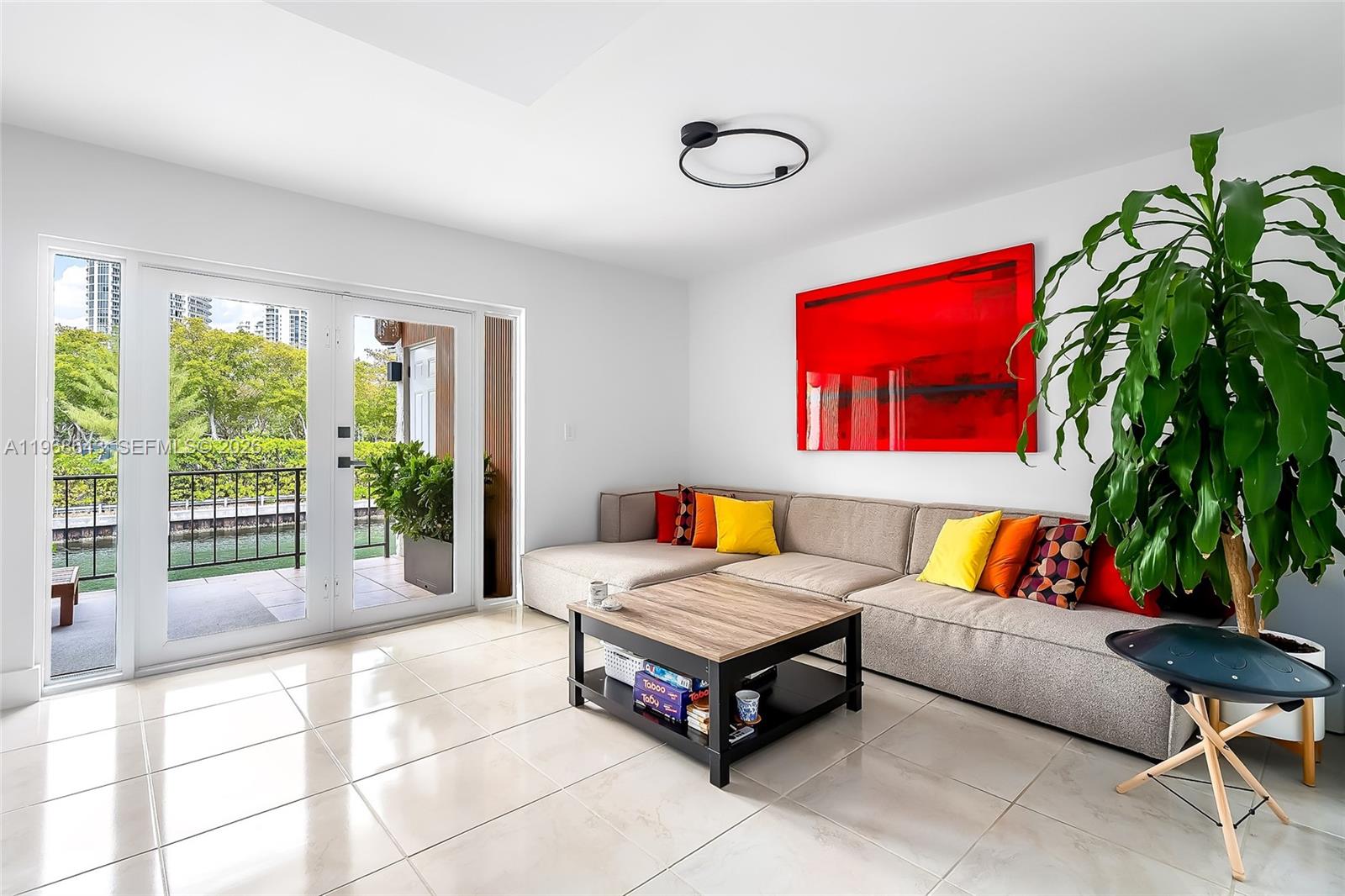 A rare opportunity to own a fully upgraded, move-in ready two-level residence in one of the most desirable waterfront communities. This sky townhouse features impact windows and doors, beautifully renovated bathrooms, and a modern kitchen with brand-new appliances.

Thoughtfully improved throughout, the home offers vinyl flooring, a custom-built closet with integrated lighting, a brand-new washer and dryer, and two private balconies that extend your living space outdoors.

Located within the gated community of Eastern Shores, residents enjoy privacy, security, and low HOA fees - all in a prime location.

A turnkey property that truly stands out.