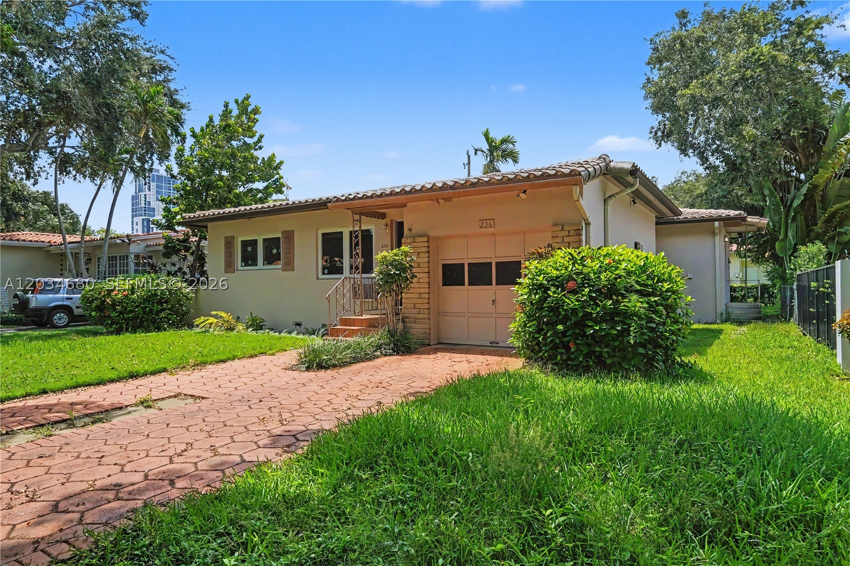 Nestled in the heart of Coral Gables, this inviting 3-bedroom, 2-bath residence offers the perfect blend of character, comfort, and location. Situated on a 6,000 SF lot, the home features approximately 1,831 SF of living space, original hardwood floors, abundant natural light, and a practical single-story layout. The spacious backyard provides plenty of room for entertaining, gardening, or future enhancements. A one-car garage and mature landscaping complete the property. Conveniently located just minutes from Miracle Mile, Merrick Park, Coconut Grove, the University of Miami, Brickell, Downtown Miami, and Miami International Airport. A wonderful opportunity to enjoy one of South Florida's most sought-after neighborhoods.