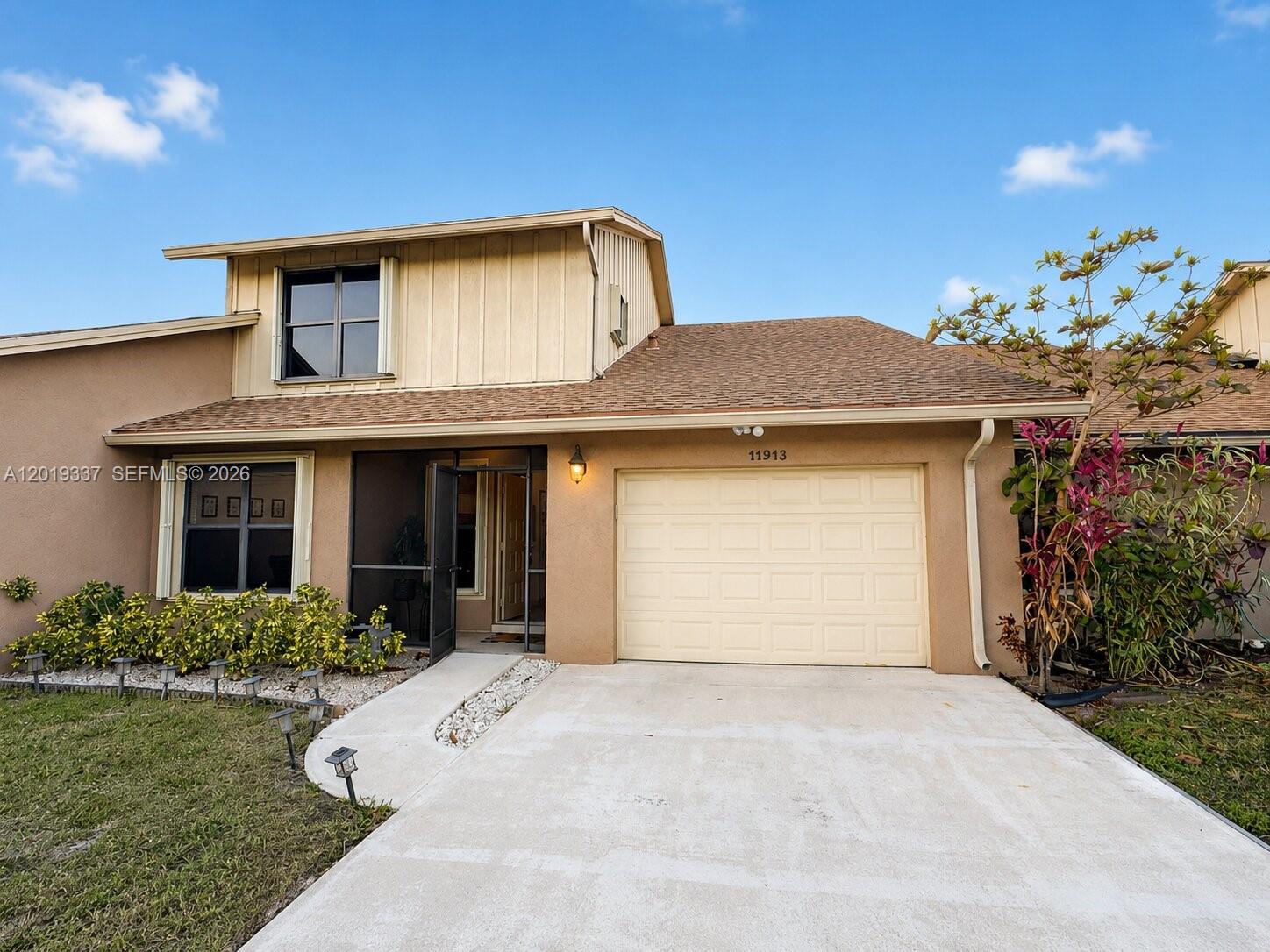 Welcome to 11913 Donlin Dr, a beautifully renovated two-story townhouse located in the desirable Park Place of Wellington community. This spacious 3-bedroom, 2.5-bath residence offers approximately 2,084 sq. ft. of comfortable living space and stands out as one of the larger floor plans in the neighborhood. Fully renovated inside in 2021 and meticulously maintained, this home is truly move-in ready. The interior features a bright and functional layout, updated finishes throughout, generous living areas, and a clean, modern feel from the moment you walk in. The two-story design provides excellent separation between the main living spaces and the bedrooms, making it ideal for everyday living, entertaining, or working from home.  The home also offers central A/C, an attached 1-car garage, driveway parking, and a comfortable unfurnished interior ready for its next owner. Located in the heart of Wellington, just minutes from shopping, dining, parks, schools, major roadways, Wellington International, the National Polo Center, and the area’s renowned equestrian lifestyle.  Impeccable, spacious, and fully updated, this home is a rare opportunity in one of Wellington’s most convenient and sought-after communities.