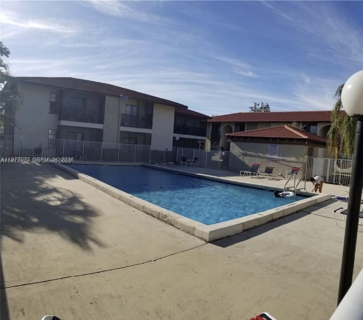 Ideal for homeowners or investors. Light-filled corner unit with 2BR/2BA, laminate flooring, washer/dryer inside, and screened balcony with storage. Excellent location near schools, shopping, dining, and transportation. Community updates include recently renewed roof and exterior paint. Parking in front. Good space for visitors. Motivated seller. Fast association approval. MOTIVATED SELLER: Offering a $3,000 credit towards buyer's closing costs with a full-price offer. For showings please text listing agent.