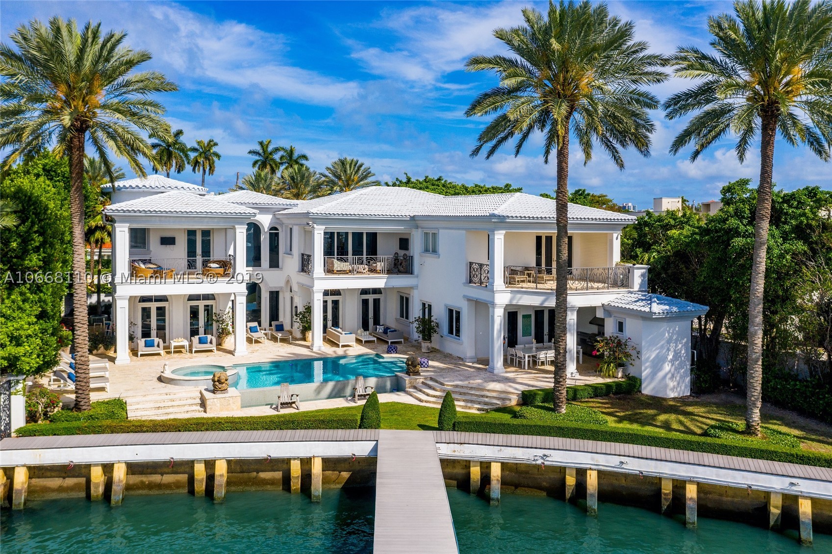The Best Open Bay Estate on the Market Under $13M! Situated on the most sought after Street in Miami Beach, this completely Redesigned North Bay Road Masterpiece offers the quintessential Miami lifestyle at an unbeatable value. Tucked behind private gates on a Prime 19,200 SF lot, this 6 BD+ Office / 7.5 BA Fully Automated Smart Home boasts 10,070 Total SF of Bespoke Interiors w/ 133 FT of Open Bay & Downtown Sunset Views. Enjoy large sun filled rooms w/ high ceilings & open bay views throughout the meticulously designed layout which is ideal for family living or lavish entertainment. The backyard is an entertainers paradise as it features covered loggias, summer kitchen & bbq, infinity edge pool w/ spa, cabana bath, downtown sunset views & dockage for a large yacht.