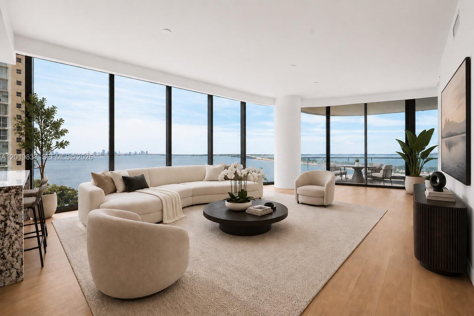 Discover sophisticated waterfront living at UNA Residences in this brand-new 3-bedroom, 3.5-bath corner residence on the 8th floor. Expansive interiors and floor-to-ceiling glass frame stunning southeast views of Biscayne Bay, Coconut Grove, and the open horizon. Thoughtfully designed with elegant wooden and marble flooring throughout, the residence features a private elevator entrance, a spacious laundry room, and a sleek Gaggenau-equipped kitchen. The expansive living and dining areas flow seamlessly onto a generous terrace, creating an effortless indoor-outdoor lifestyle ideal for both entertaining and everyday living. Residents at UNA enjoy an exceptional amenity experience, including three resort-style pools, a state-of-the-art fitness center, and an Aman-inspired spa concept, all within a private waterfront enclave in Brickell just moments from Coconut Grove, Downtown Miami, and the beaches of Key Biscayne.