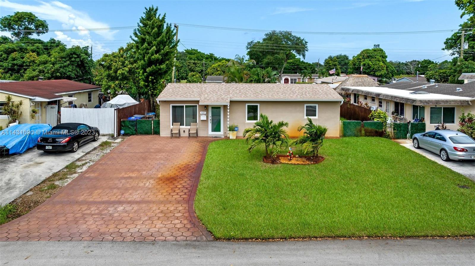 **MULTIPLE OFFERS RECEIVED. HIGHEST AND BEST BY MONDAY 08/14/2023 AT 12 PM***Inviting and spacious open floor plan home now available! Home offers 3 bedrooms. The kitchen has been renovated, featuring beautiful countertops that offer both style and functionality. A/C about 1 year old, Roof about 5 years old, new tankless water heather, new pool deck. New Impact windows and doors are installed, adding to the property's security and resistance to extreme weather. Additionally, there's a Florida room, which could be used for various purposes such as storage or a home office. A spacious fenced patio adds outdoor living space and privacy. An above-ground pool is included in the sale, providing a potential space for relaxation and recreation.
