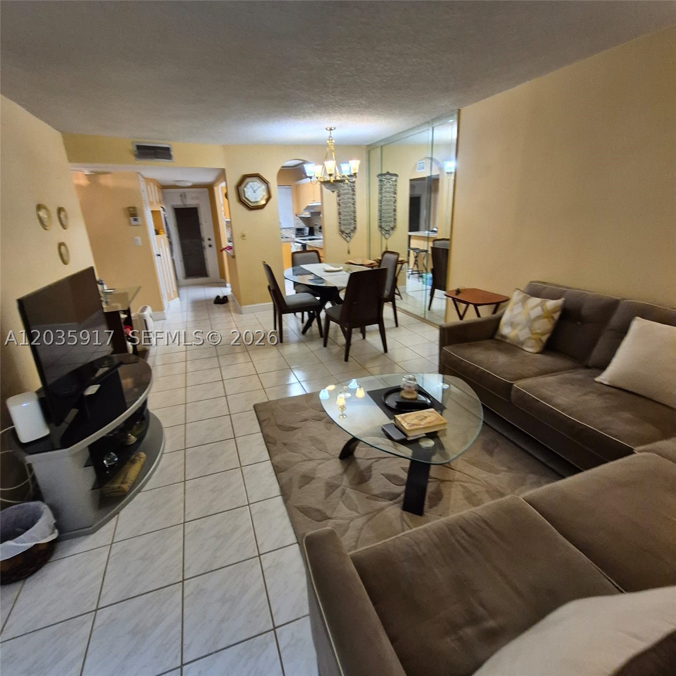 This great two-bedroom, two-bathroom apartment features elegant tile floors throughout the entire space. kitchen updated .Toilets and sick are new in bathroom and the master suite offers a closet With lots of natural light and a private balcony, this condo is a perfect blend of style.