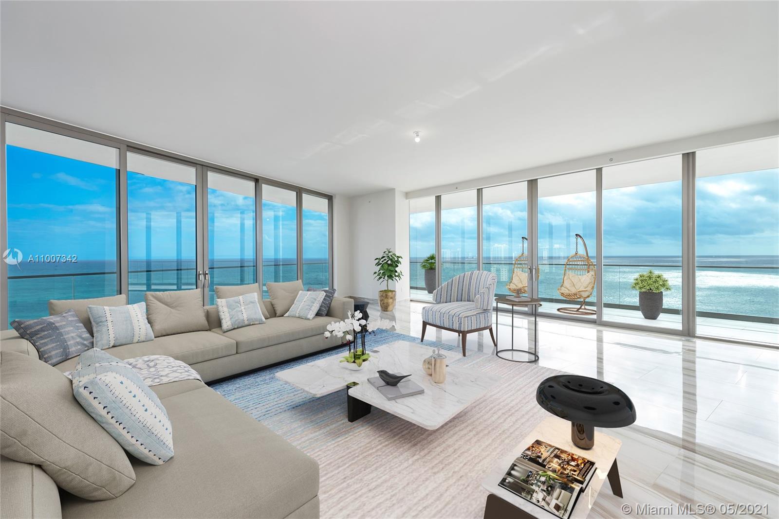 Amazing residence with breathtaking views of the Atlantic Ocean with it's sunrises and City sunset views. UNIT COMES WITH DIRECT OCEAN PRIVATE CABANA. 10 feet ceilings. Expansive 10-foot-deep private terraces. Summer kitchen with Sub-Zero refrigerator and grill.  Armani/Dada custom kitchen: lacquered cabinetries,  natural stone counter tops; Sub-Zero refrigerator, freezer and wine cooler; State-of-the-art Wolf appliances. Armani/Roca designed bathroom; custom made vanities with natural stone cladding, spacious showers and tub, High-performance Toto toilet with integrated bidet technology. Italian Restaurant with room service, party room, game room, 2 level spa, yoga/pilates room, gym, movie theatre, cigar and wine room, kids room,  and beach service. Virtually staged.