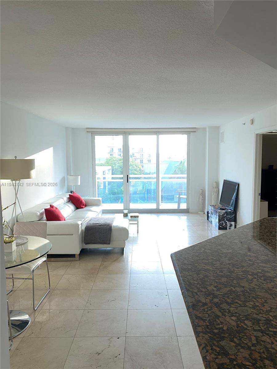 Experience Miami Beach living in this newly remodeled one-bedroom condominium featuring spectacular, unobstructed city views. This residence showcases marble travertine flooring, a sleek open kitchen with premium stainless steel appliances, and granite countertops. The generously sized bedroom includes a walk-in closet and excellent storage. Enjoy the convenience of being within walking distance to dining, shopping, and daily essentials, plus direct beach access. Residents enjoy a full suite of amenities including heated pool, fitness center, sauna, steam room, attended lobby, and valet parking. New A/C and Water heater.
24-hour notice required for showings. Tenant occupied.