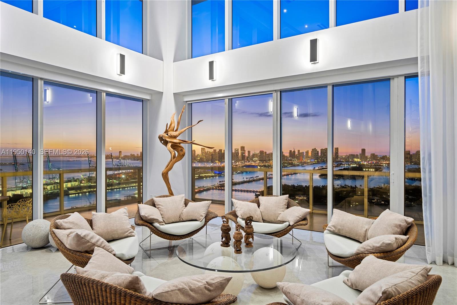 An irreplaceable trophy penthouse, crowning South of Fifth at the iconic Philippe Starck–designed ICON South Beach, establishes a new benchmark for Miami Beach luxury. This extraordinary tri-level masterpiece presents a bespoke private rooftop terrace, on e of the largest in Miami Beach, spanning over 11,000 sf of outdoor living, commanding unobstructed 360-degree panoramic views across every horizon. The private rooftop sanctuary is designed for grand-scale entertaining and elevated everyday living, featuring a saltwater pool, expansive sun lounges, a professional-grade outdoor kitchen with BBQ, dining for 18, a fire pit, and multiple wraparound terraces across all levels, creating a seamless indoor-outdoor lifestyle at an unprecedented scale.Two sculptural floating staircases, illuminated by dramatic skylights, connect the residence’s three levels. Soaring 20-foot floor-to-ceiling glass walls frame breathtaking vistas from sunrise to sunset, capturing the Atlantic Ocean and pristine beachfront, cruise ships gliding past Fisher Island, sweeping open bay views, and Miami's skyline sunsets.The grand principal suite is a private retreat encased entirely in glass, showcasing a spa-inspired bath with a floating shower and soaking tub, multiple walk-in wardrobes. The PH also offers two family rooms, two wine cellars, a bar lounge, billiards room, and private gym. Completing the offering is a private 7 car garage. This is a world-class legacy estate at the very to of Miami Beach.