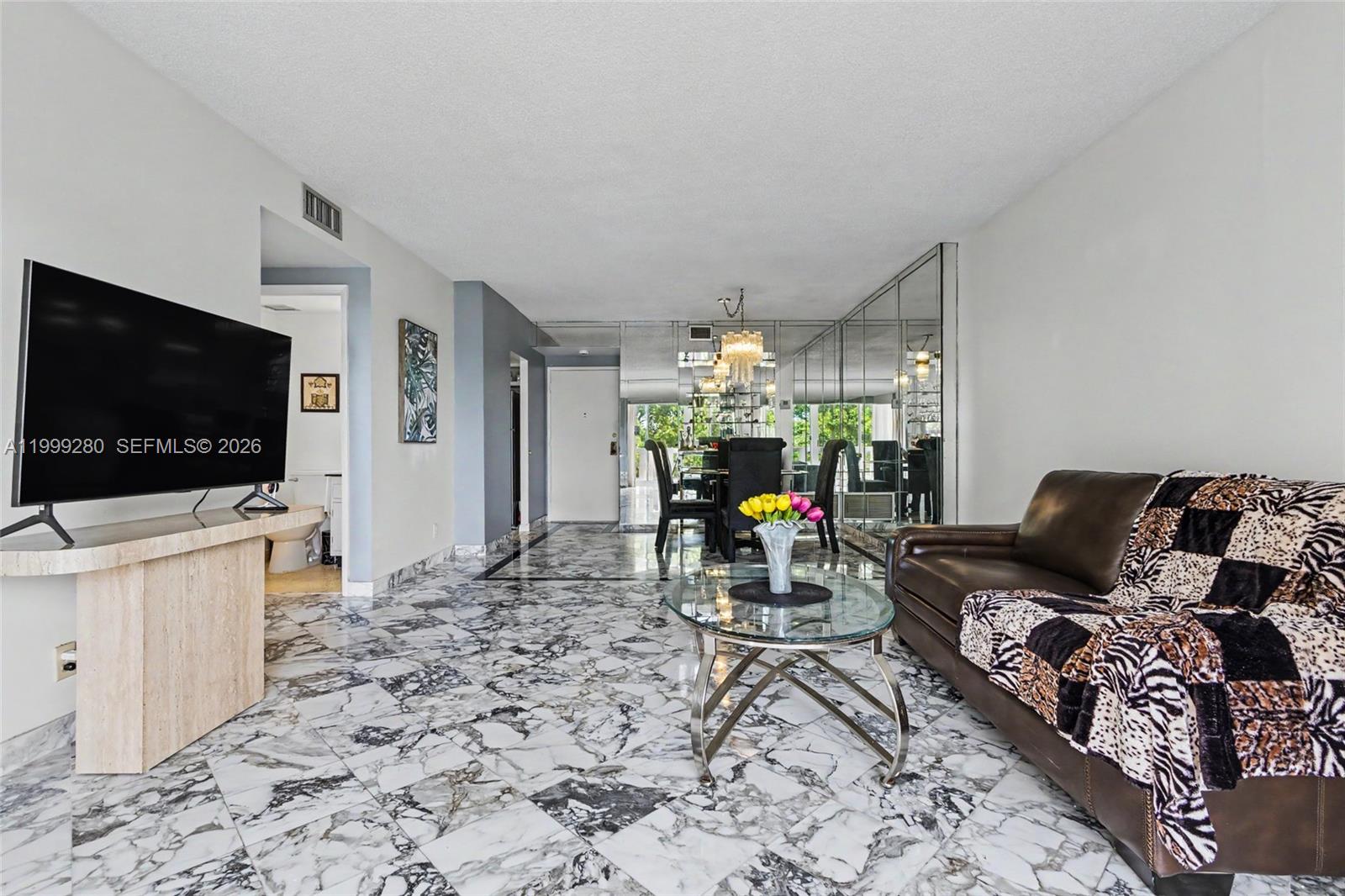 Light and bright 1/1.5 unit with wonderful pool and garden views.  Enclosed balcony makes for a wonderful office or den.  Beautiful marble floors.  Updated a/c and hot water heater 2025.  Large eat-in kitchen.  Spacious master suite with walk-in closet.  Highly sought after Hillcrest is close to shopping, dining, beaches, Hardrock Hotel & Casino, Gulfstream Park & Racing, Ft. Lauderdale Airport, all major highways and the Famous Hollywood Boardwalk.  Building enjoys security, extra storage, heated pool and miles of private walking paths.  Hillcrest community has a clubhouse w/kitchen/barbeque area.  No leasing.