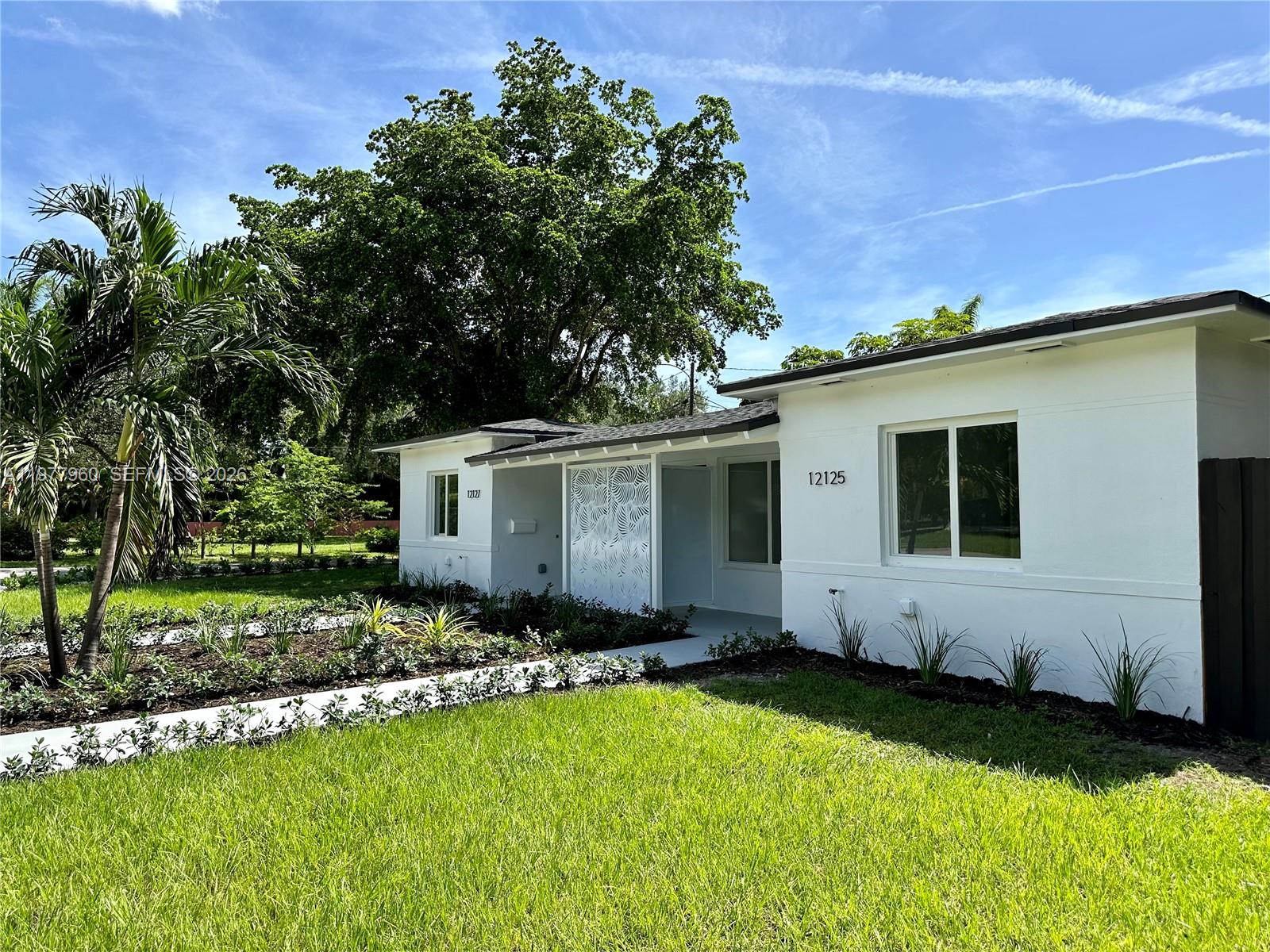 Fully recently renovated duplex on corner lot bordering Biscayne Park/North Miami! Entire property underwent full renovation with permits- roof, electrical, plumbing and structural components are all relatively new. Property consists of two 2-bedroom, 1-bathroom units (4 bedrooms, 2 bathrooms total). Each unit features updated kitchen and bathroom, central A/C, impact windows and doors throughout, stainless steel appliances, quartz countertops, large-format porcelain tile flooring, closet organizers, recessed lighting, remote ceiling fans and private fenced backyard space. Samsung washer and dryer located inside of each apartment. Both units are leased to excellent stable tenants. Property zoned for up to 3 units, potential to build one more apartment on property. TENANT OCCUPIED, BY APPOINTMENT ONLY.