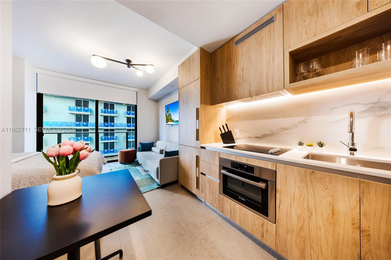 Fully furnished studio at The Crosby Miami. Turnkey and ready to generate income immediately after closing. Ideal for short-term rentals or vacation home. Daily rentals are allowed in the building. Floor-to-ceiling windows and resort-style amenities featuring a rooftop pool, spa, sauna, fitness center, indoor garden, and 24/7 concierge service. Prime location just steps from kaseya Center, Brightline, world-class dining and entertainment. One of the lowest HOA fees in the area. Includes a storage unit.