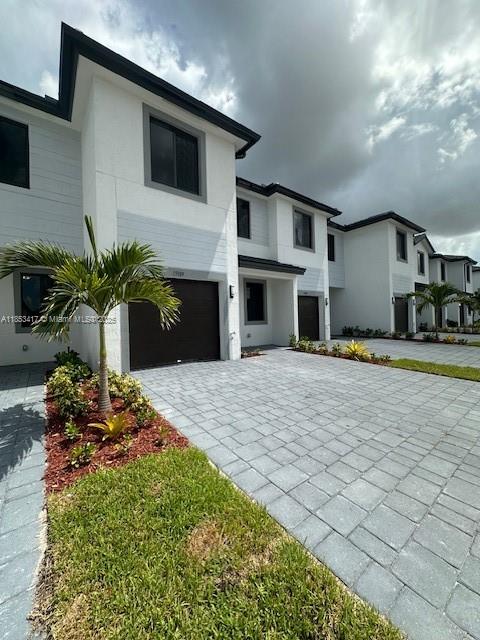 Welcome to this Brand New beautiful townhome with 4 bedrooms and 3,5 bathrooms. Enjoy a modern Kitchen with stainless steel appliances, quartz countertop, and a beautiful backsplash. The ground floor includes a formal living room, dining area, and a great room that connects to a backyard patio. Includes zebra blinds and a washer/dryer. The garage has space to store. Hurricane Impact Windows & Doors. Fenced backyard with concrete patio. located close to the Florida City, restaurants, new PUBLIX supermarket and Outlets mall