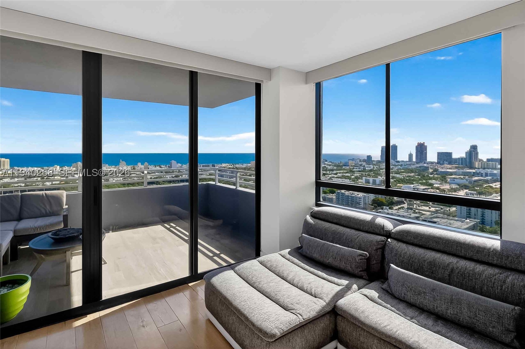 Sweeping views of the ocean and the Miami Beach skyline from this sun-filled corner residence in the heart of West Avenue. This charming 2-bedroom, 2-bath home blends effortless coastal living with thoughtful modern upgrades, creating a space that feels both refined and relaxed.

The fully updated kitchen features top-of-the-line appliances and custom cut marble waterfall countertops—perfect for quiet mornings or entertaining at sunset. Both the primary en-suite and guest bathrooms have been beautifully remodeled, while automatic privacy blinds, a newer AC, and an in-unit washer and dryer add comfort and ease to everyday living. Step outside to an oversized private balcony and take in the city, sky, and sea.

Set within a full-service, bayfront building offering 24-hour front desk and valet, residents enjoy resort-style amenities including a waterfront fitness center, bayside pool, tennis court, putting green, outdoor kitchens, and sunset gardens overlooking the bay. Assigned parking on the second floor adds convenience.

Just moments from Lincoln Road, some of the top restaurants, Whole Foods and Trader Joe's—this is South Beach living at its most effortless and inspired. A Must See!