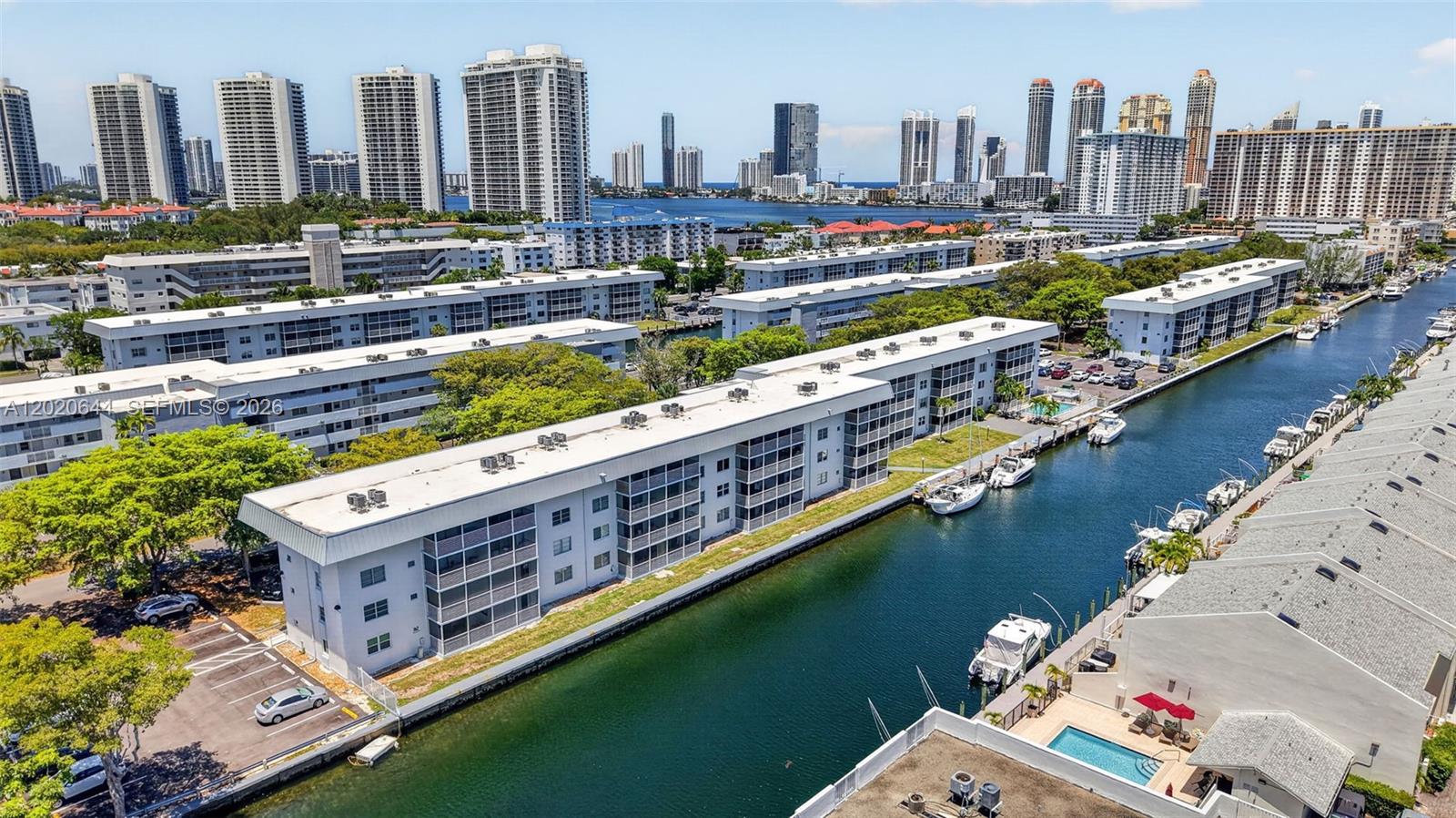 Amazing unit in excellent condition. Ready to move in. Some new furniture included in sale. Unit features New AC unit, upgraded electrical panel, all done with permits and approved and closed with city of NMB. Spacious open kitchen and living area. Beautiful tile throughout entire unit.  Large bedroom with great closet space. Upgraded bathroom. Unit on top floor with great intercoastal views. Unit easy to show. located in the highly desirable gated community of Eastern Shores. This prime location puts you just minutes from the beach, Oleta State Park, Sunny Isles, Bal Harbour, Aventura Mall, and more. The building has had major improvements, including a new roof, restored concrete balconies, new elevators, and full 50-year certification compliance. The community offers great amenities such as a clubhouse, heated pool, and fitness center. HOA includes water, cable, internet, garbage, pest control, and insurance. Boat dock for purchase through HOA. At least one owner to be at least 55+ Equal Housing opportunity.
