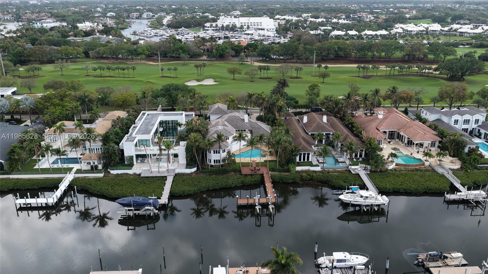 Fantastic opportunity in Admirals Cove on a deepwater lot located just a few homes from the Intracoastal Waterway. This property presents an excellent chance to build your dream home or complete a renovation in one of Jupiter's most desirable boating and golf communities. Spyglass is home to some of the most impressive estates in Admirals Cove, and this presents a chance to create your own. Golf course views in the front and water views in the back further highlight the unique setting of this property. The interior of the home has already been largely demolished in preparation for renovation, offering a head start for a buyer looking to reimagine the existing structure or start fresh with a new build.

With deepwater access and close proximity to the Intracoastal, this property is ideally and close proximity to the Intracoastal, this property is ideally positioned for boating enthusiasts seeking quick access to open water. Admirals Cove is known for its exceptional lifestyle and amenities, including 45 holes of championship golf, two clubhouses, two driving ranges, a full-service marina, tennis and pickleball courts, a state-of-the-art fitness center, and multiple dining venues. Residents enjoy a private club atmosphere combined with world-class boating and golf in one of Jupiter's premier waterfront communities.