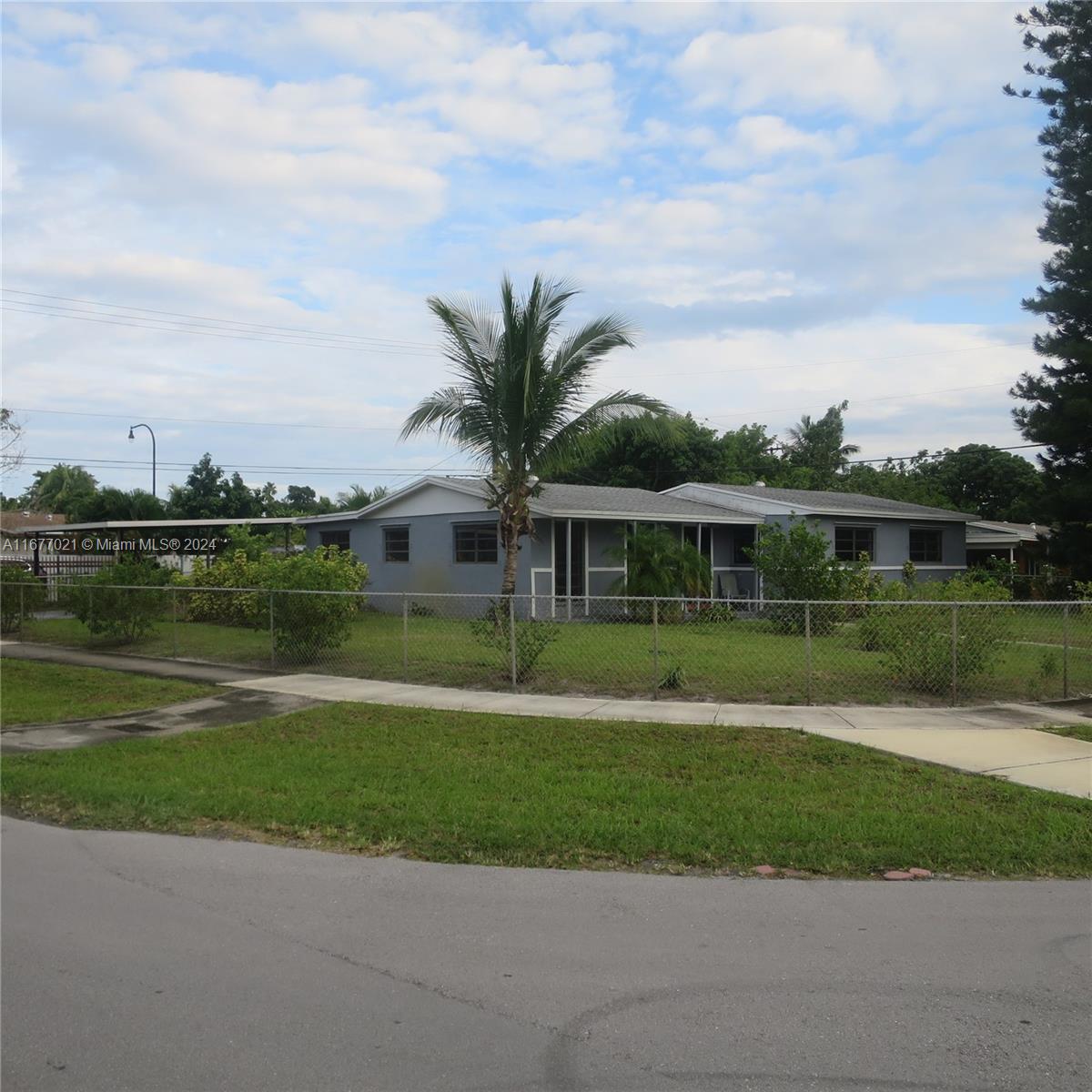 I’m Excited About This Property! …. Now Let Me Tell You Why! …. BUY - RENT - RENT-TO-OWN! Corner Lot – Prominent Anchor Position,  This house is fully gated & secure! Built: 1958, 3 Bedrooms + 4th Bedroom/Den, 2 Bathrooms, Kosher Kitchen w/Cozy Eat-In Area! Tile Floor Thru Out & Carpet in bedrooms, Interior:  2,059/sf, Over Sized Lot w/9,316/sf, Parking: Car Port – 8 Cars! ……. Client Must View VT – “Virtual Walk Thru” BEFORE SHOWNING APPOINTMENT!