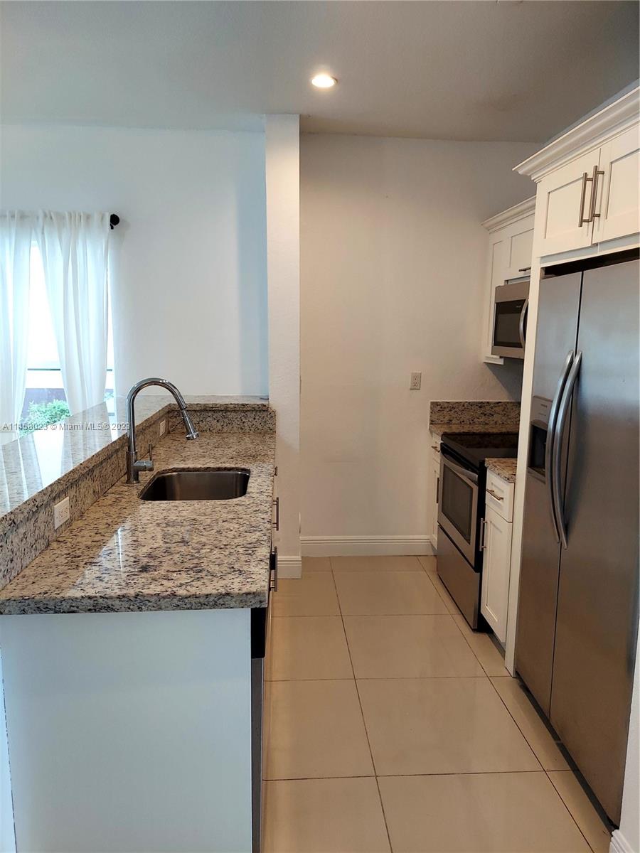 MILLENNIUM TOWNHOMES COND - Residential