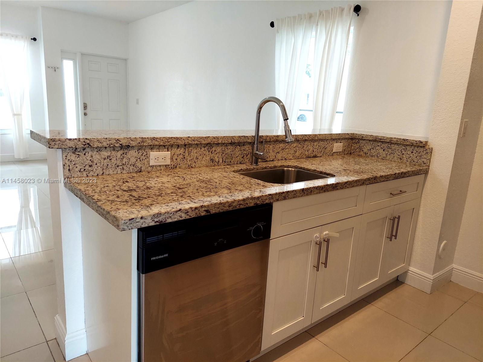 MILLENNIUM TOWNHOMES COND - Residential