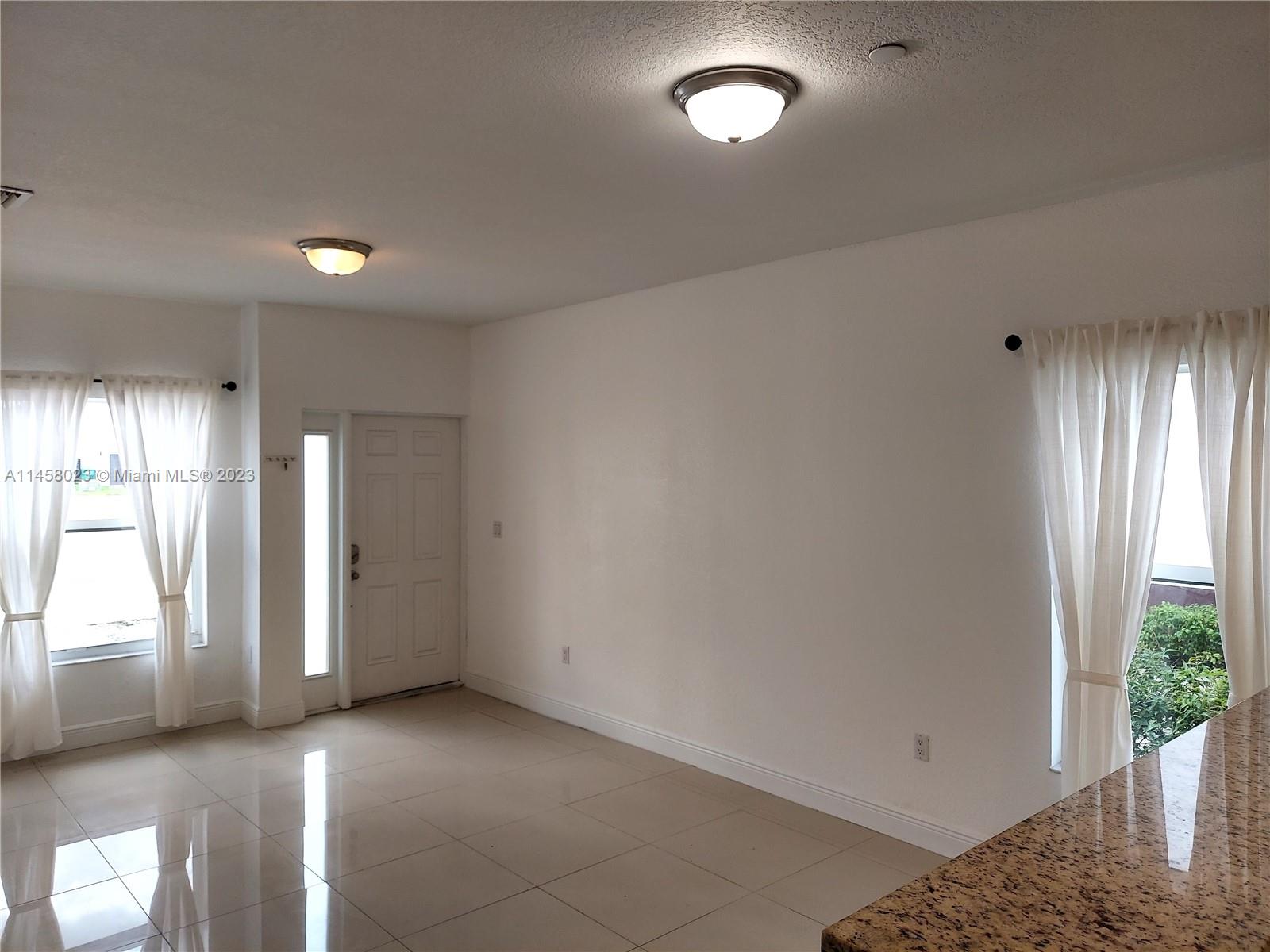 MILLENNIUM TOWNHOMES COND - Residential