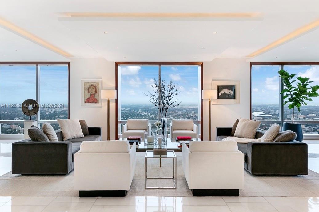 When you want the level of service of a 5 star hotel while still keeping the privacy of home. Step into this 70th floor Penthouse w breathtaking views.Three Units were combined to make almost 6,000 SF of LA.Impeccable attention to detail is seen throughout, wood floors,bar area w ocean & city views, 2 oversize living rooms, open terraces & floor to ceiling windows.Snaidero kitchen is an epicurean dream w top of the line appliances.Primary suite w ample sitting area has skyline & water views, two over-size closets, expansive bath overlooking the city & a grand shower for two. Residences have a separate entrance w a dedicated concierge, 24-hour room service, personal shopping and more.Penthouse includes 6 memberships to Equinox & 4 parking spaces.A perfect place to find your perfect peace.