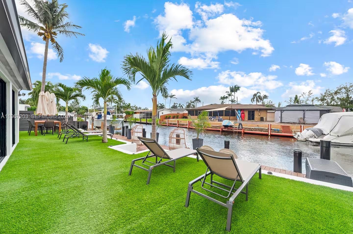 WATERFRONT DUPLEX in Dania Beach, on an ocean-access canal—a rare OPPORTUNITY for buyers seeking a Dania Beach investment property with boating and short-term rental upside. This FULLY REMODELED  NEW ROOF  IMPACT WINDOWS duplex features TWO UNIT of 2-bedroom, 1-bath, each updated and set up for flexible use: live in one and rent the other, rent both, and add a third income stream by monetizing the dock for a 50-foot boat. Property is represented as a certified Airbnb / short-term rental setup (buyer to verify licensing, zoning, and city requirements). Prime location near Hollywood Beach, Dania Pointe, restaurants, and Fort Lauderdale-Hollywood International Airport (FLL)—perfect for vacation rental demand and long-term value.