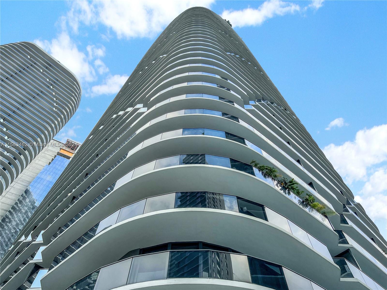 Step into extraordinary living in this beautifully furnished condo featuring hardwood floors, floor-to-ceiling windows, and top-notch appliances. The unique round architecture adds a touch of luxury. Enjoy two pools, a jacuzzi, a spa, a gym, and more across two amenity-filled floors. Conveniently situated near Mary Brickell Village, Brickell City Centre, Publix, and top-notch restaurants. Water, Wifi, and cable included. 6-month lease is preferred. One assigned parking space via valet only. Elevate your lifestyle with this exceptional  rent opportunity!  "It's also for sale!"