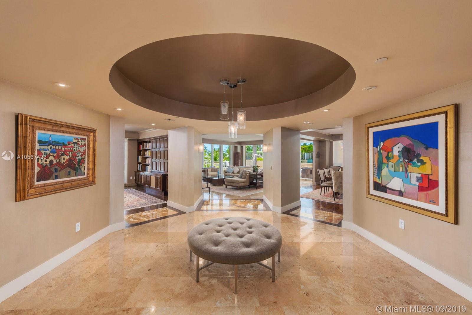 Unique! One of many words that beautifully describes this 6,584 Sq Ft, multi-level apartment which feels like a waterfront home. This very select lanai offers an extremely large terrace which is approx 3,710 Sq ft with your own private pool + Jacuzzi. Steps away lies the gorgeous sandy beach of Florida’s East coast. Top of the line finishes beside an array of 6 bedrooms, 6 full bathrooms +2 powder rooms set this gem of a residence on its own tier of luxury and distinctiveness  (main unit has 5 bedrooms and guest house has 1 bedroom). Private garage for 2 cars + 3 additional assigned parkings.