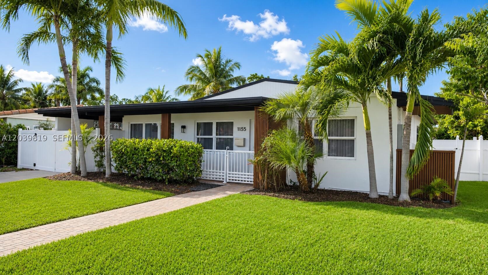 Fully updated 2-bedroom, 2-bathroom home in Hollywood with no HOA. Recent improvements include a 2021 roof, 2025 A/C system, impact windows and doors, updated electrical panel, renovated bathrooms, new vinyl flooring throughout, and an updated kitchen with modern appliances. Washer and dryer are included.

The property features a spacious Florida room enclosed with new screen mesh and finished with decorative designer wall panels. Offering approximately 330 sq ft of additional usable space, it provides an excellent area for relaxing or entertaining. A large tiled terrace adds even more outdoor enjoyment.

Conveniently located near Hollywood's golf courses, parks, shopping, dining, entertainment, and major roadways.

Move-in ready and easy to show.