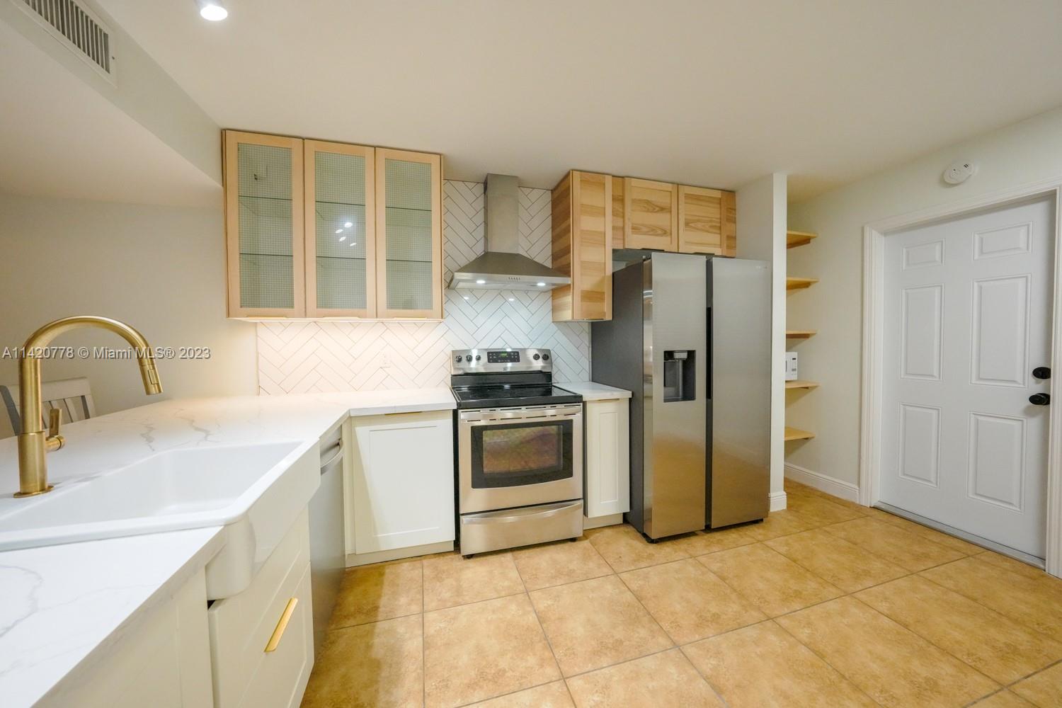 Ready for occupancy!  Rapid approvals.  Immaculate, spacious 2/2.5 townhouse with one-car garage in gated community of Flamingo Villas with 24-hour security.  Walking distance to community pool.  Renovated kitchen and bathrooms.  Fully-tiled.  Impact windows and doors.  Eat-in kitchen you can enter from garage, convenient for bringing in groceries on a rainy day.  Private, screened-in patio.   Half bathroom downstairs.  Two master bedrooms upstairs.  New washer/dryer.   All appliances in excellent condition!! Digital keypad entry.  Amenities also include tennis courts, gym, racquetball court and steam room.  Excellent location in Pembroke Pines off of Johnson St. and Flamingo Road.  Zoned for excellent schools. One-week homeowner association approval. Excellent landlords.