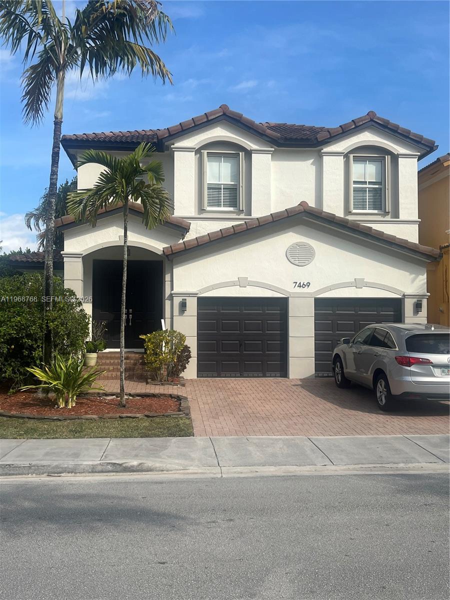 Great updated four bedroom coach corner home in Polynesian in Islands at Doral. This house has all four bedrooms upstairs giving you ample family and living rooms with a separate dining room. Half bath downstairs for the guest and through the two story foyer you will find your way upstairs. Three bedrooms share the one bathroom and the main bedroom has it's own updated bathroom. Two bedrooms have build in closets and the main bedroom has a large walk-in closet. All appliances are less then two years old. A/C is about four years old. Nice patio surrounded by mature palm trees giving you lots of shade and privacy. Polynesian is very close to the NW 74 Street exit from the turnpike and close to shopping, restaurants and great schools. The community pool is currently undergoing renovations and the main clubhouse nearby has two pools, gymnasium, tennis courts, basket ball courts and kids playground.