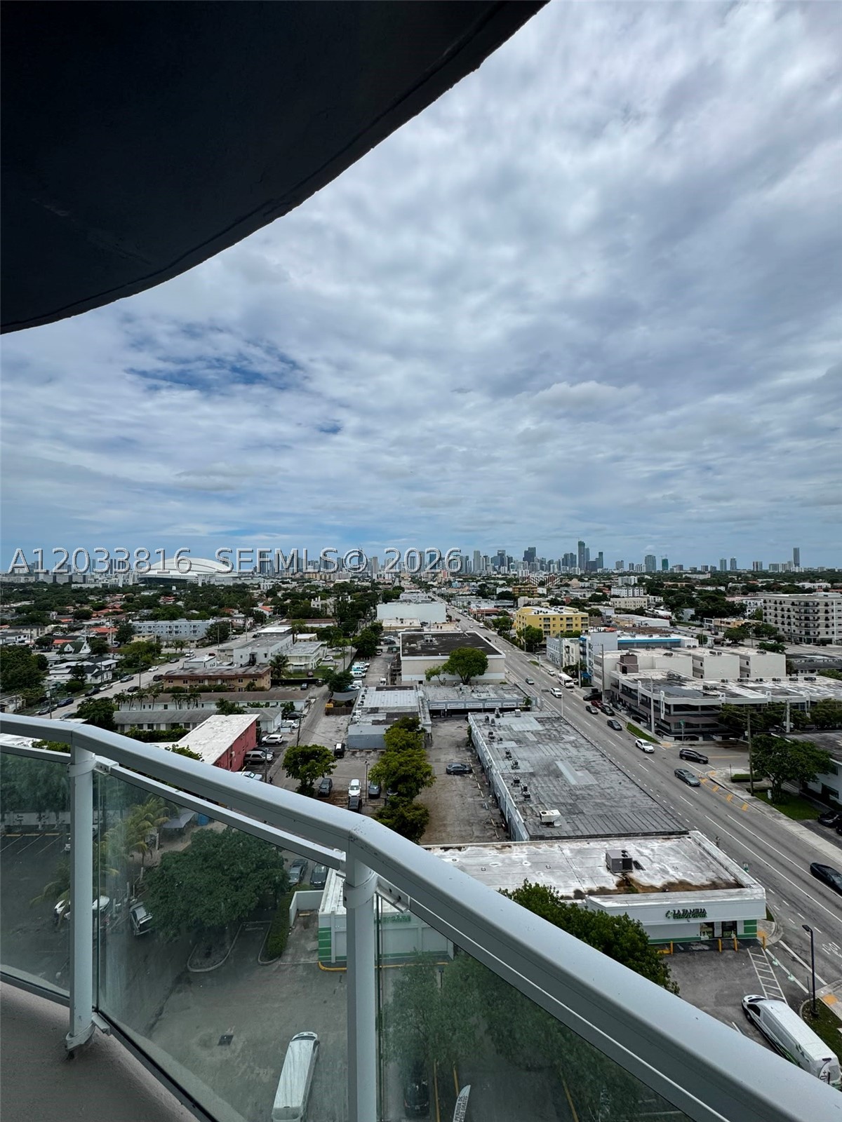 Best Line in the Building! Spectacular southeast corner unit with breathtaking views of Brickell, Downtown Miami, and the iconic Miami skyline. Featuring tile floors throughout, high ceilings, an open-concept kitchen with granite countertops, abundant cabinetry, and stunning 180-degree city views. Spacious primary suite with large walk-in closet, whirlpool tub, and separate shower. Second bedroom includes a private en-suite bathroom, plus a convenient powder room for guests. Enjoy a large wraparound balcony, in-unit washer and dryer, one covered parking space, and ample visitor parking. Centrally located with easy access to Brickell, Downtown, major highways, dining, shopping, and entertainment.