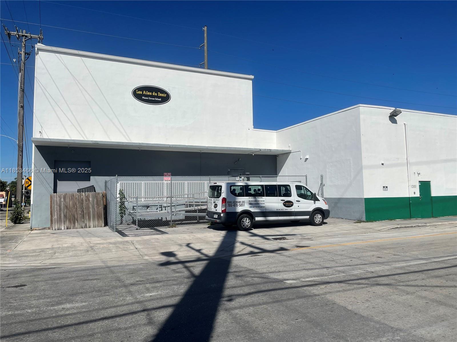 Welcome to Allapattah! This former ice factory w/a combined 15,000 SF +/- warehouse sits on a 17,493 SF corner lot of a wide one-way street that is destined to be the main thoroughfare of this exploding district.  The building currently consists of 2 easily combinable sections. Space #1 is +/-5,000 SF performing arts studio w/soaring +/- 27’ ceilings that was completely renovated w/new A/C, Electric, Bathrooms, Floors, Lighting & loading dock & currently a circus school. Space #2 is 10,000 SF +/- w/14’ ceilings of mostly wide-open space w/2 offices, a dock height loading dock & an oversized street loading door providing easy access for trucks & deliveries. W/proximity to Wynwood & the Medical Corridor it is uniquely positioned to become the cornerstone of the next great neighborhood.