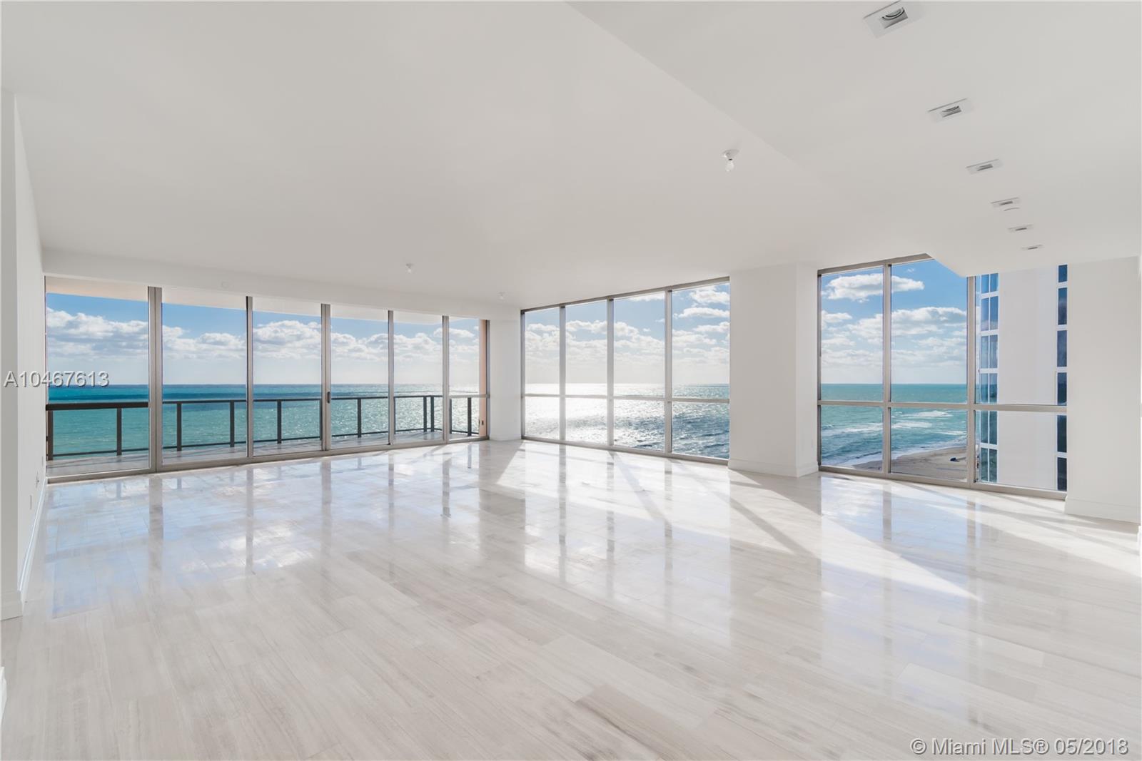 Spectacular oceanfront corner unit with SE exposure in one of the most magnificent buildings in all of Florida. This incredible three bedroom has over 4,600 sqft of interior and boast two large terraces with with a private Jacuzzi and summer kitchen. His and hers private master bathroom and crocodile embossed leather closets and gas fire place is just one of the many features you'll be able to enjoy in your incredible new residence! The Mansions at Acqualina is one of a kind with the best amenities and services from the one and only the Five Star/ Five Diamond Acqualina Resort & Spa!