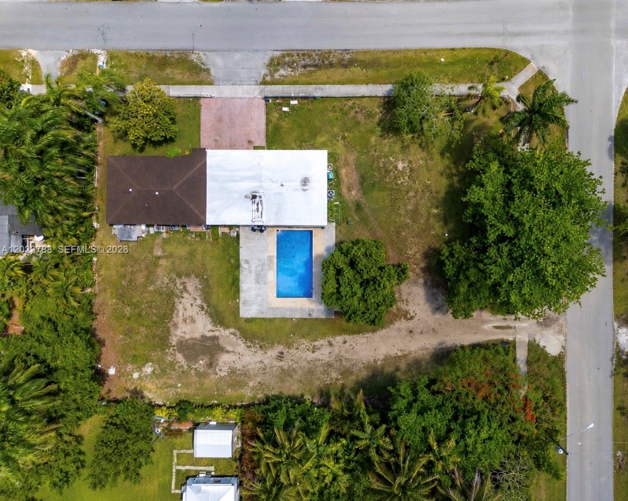 Welcome to this exceptional corner-lot property located in a highly desirable area of Homestead. This spacious residence offers 7 bedrooms and 3 bathrooms, providing an outstanding layout suitable for large families or investment opportunities.

Situated on a generous half-acre lot, the property offers privacy, space, and endless potential for expansion or customization. Its corner location enhances accessibility and maximizes outdoor space usage.

Enjoy your own private swimming pool, perfect for entertaining and embracing the South Florida lifestyle year-round.

The home is thoughtfully structured to accommodate two-family living, making it an excellent option for multigenerational households or income-producing use.

? Property Highlights:

7 Bedrooms / 3 Bathrooms
Corner Lot
Half-Acre Property
Private Pool
Prime Homestead Location
Designed for Two-Family Living

This is a rare opportunity to own a versatile and spacious property in one of Homestead’s most convenient and growing areas.