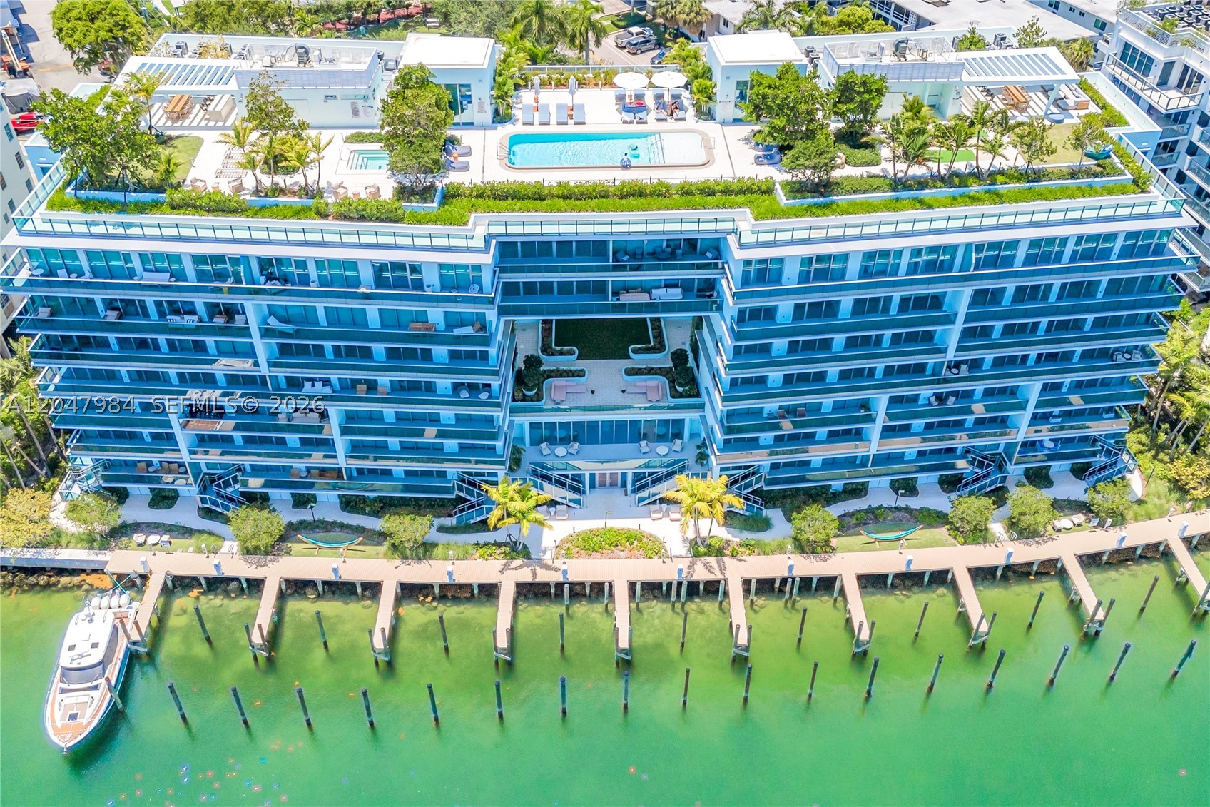 Elevate your lifestyle in this stunning waterfront penthouse featuring 3 bedrooms and 3.5 baths, plus private boat dock, offering breathtaking views of the Intracoastal and the Miami skyline. This exquisite unit is sold fully furnished, allowing you to move in effortlessly and start enjoying your new home right away. With spacious interiors adorned with high-end finishes, including wide-plank European floors, and a chef’s kitchen with custom imported Italian Snaidero cabinetry and a full Miele appliance package, it boasts an open-concept layout perfect for entertaining. The luxurious master suite includes a spa-like bathroom, while each bedroom offers ample space and privacy. Enjoy top-notch amenities including a state-of-the-art fitness center, private lounges and rooftop pool and barbecue area,  valet (2), storage, and private marina with pick-up/drop-off, super convenient for boating enthusiasts.  Walk to the beach, dining, and the Bal Harbour Shops. Located in the heart of Bay Harbor Islands, La BAIA offers unparalleled convenience with vibrant dining, shopping, and cultural experiences just steps away.