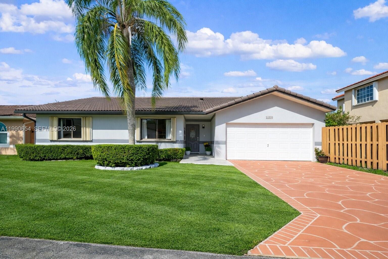 Lovely 3/2 pool home located in Oakwood Estates is now available!  Come see this gem nestled in a quiet Hammocks neighborhood,  where the vibe is both tropical and tranquil.  Brand new roof, newly remolded master bathroom and recentlly painted pool deck, driveway and garage make this property move in ready.  For the tropical fruit lovers you have lychee, mango, star fruit, loquat, coco and avocado just steps from your backdoor.  The back fence leads you out to one of hammocks smaller private lakes where you can find a dog park, club house with pool, playground and elementary school all walking distance, easy and fun way to get all steps in.   With over 2300 sqft of living space and large backyard, this house is perfect for hosting family and friends or a staycation with fresh mango smoothie poolside. Don't miss out on all this home has to offer.