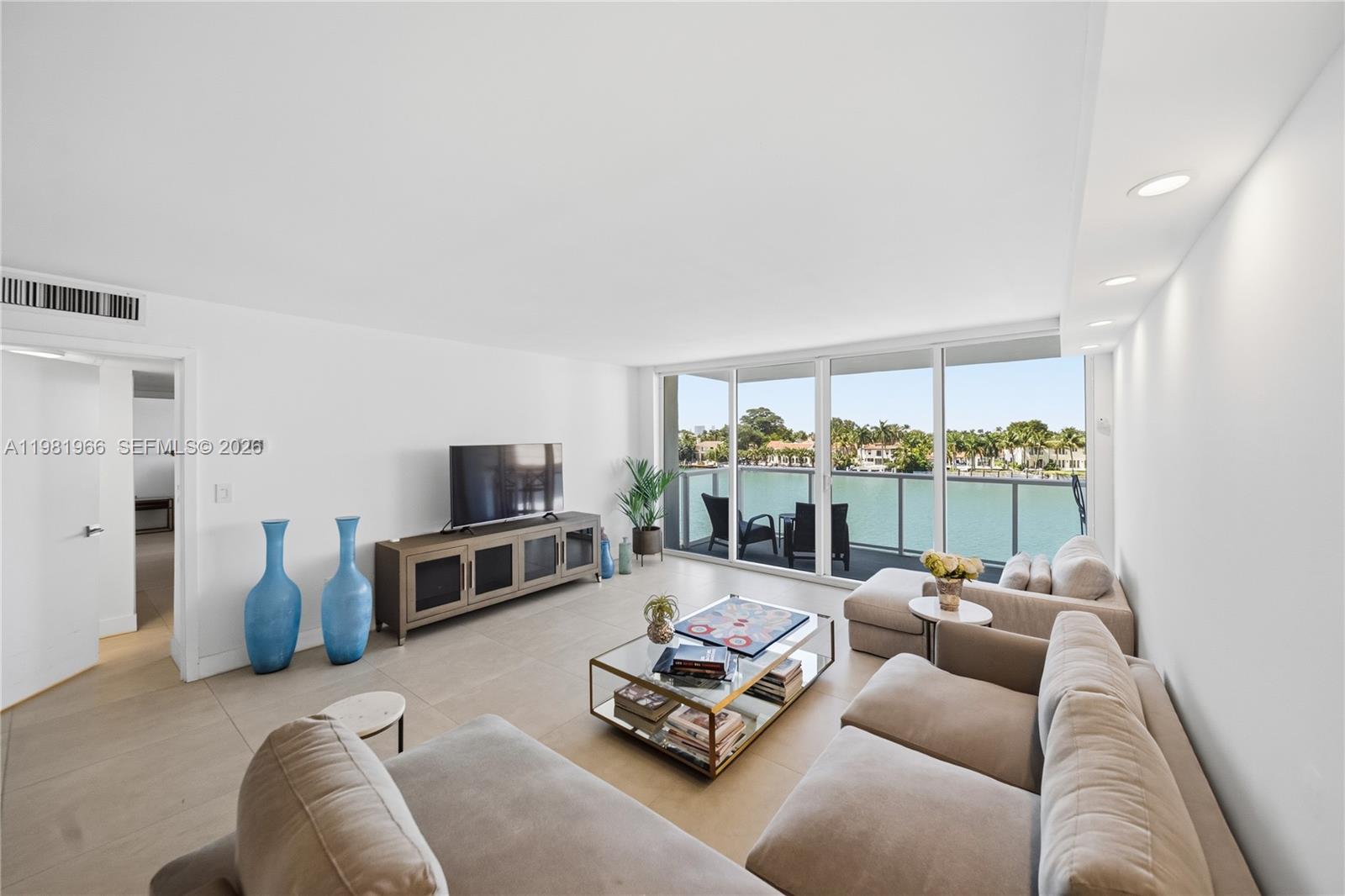 Beautifully remodeled corner residence in an iconic Morris Lapidus building in Mid Beach, offering a rare sense of openness and tranquility. Bathed in natural light, the residence enjoys breathtaking Intracoastal water views that truly make you feel as if you are living on a boat. The spacious balcony invites you to relax, dine, or entertain while watching boats pass and taking in spectacular sunsets over the water. With protected views that will never change, this home offers a unique and lasting connection to the waterfront. Thoughtfully renovated with modern finishes, generous living areas, excellent closet space, and the convenience of a washer and dryer in the unit. Perfectly located
across from the beach and the boardwalk, enjoy the true Miami Beach lifestyle with morning ocean walks, biking, and easy access to parks, cafes, and neighborhood favorites. A rare and special offering priced to sell.