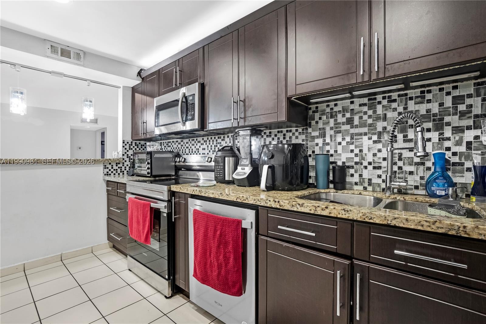 SUNSET PALMS EAST CONDO - Residential