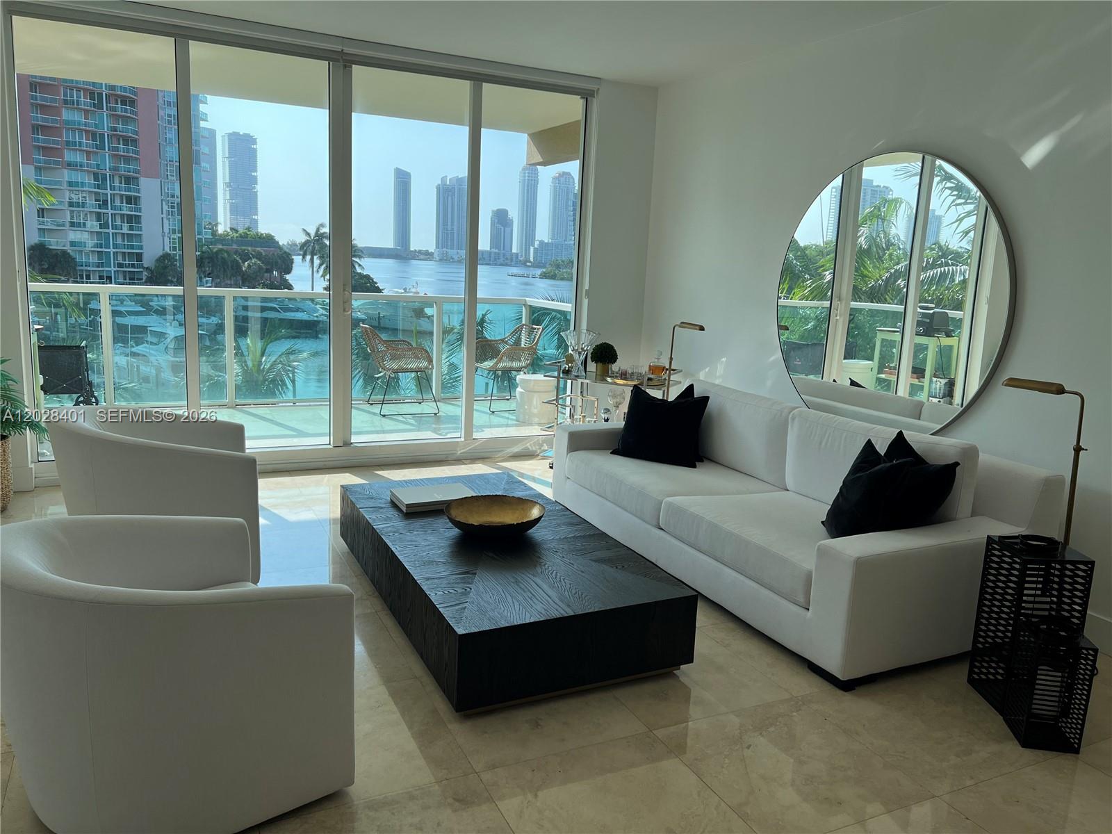 Luxury Waterfront Corner Residence at Aventura Marina – 2 Beds + Den | 2.5 Baths
Experience elevated living in this beautifully updated corner residence at Aventura Marina. This spacious 2-bedroom + den, 2.5-bath condo offers approximately 1,670 SF of elegant interior space with breathtaking Intracoastal and marina views from expansive floor-to-ceiling windows. Corner exposure fills the residence with abundant natural light, creating a bright and sophisticated atmosphere throughout.
The thoughtfully designed floor plan features marble and wood flooring, an open living and dining area, and a versatile den ideal for a home office or guest space. The spacious primary suite offers comfort and privacy, while the second bedroom includes its own en-suite bath.
Located within the gated community of Aventura Marina, residents enjoy resort-style amenities including 24-hour security and concierge, valet, fitness center, spa, clubhouse, marina access, pools, and children's play areas, all just moments from Aventura Mall, Founders Park, fine dining, and beaches.