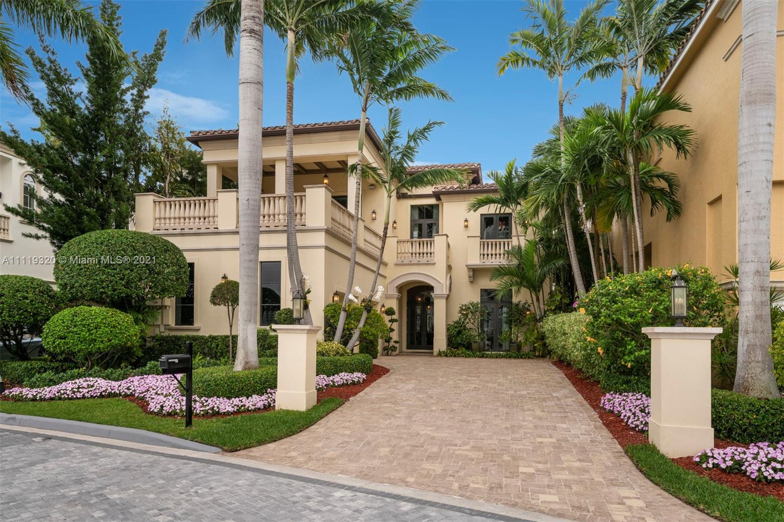 Spectacular waterfront mansion in the exclusive gated community of Island Estates. 5 beds, 6 full & 2 half bathrooms. Enjoy breathtaking sunrises over the Intracoastal; backyard features a sundeck, pool, jacuzzi, wood-fired & gas grills and spacious covered patio. Family room, breakfast area & gourmet chef’s kitchen w/ butler’s pantry leading to a vast dining room with a one-of-a-kind water wall. The living room is anchored by a wet bar & a custom-made fireplace. The light-filled office nods to mid-century classics - an ideal WFH setting. Upstairs, 4 bedrooms w/ en suite baths & terraces facing east and west. Watch the sunset as you unwind w/ a glass of wine. Entertain 10 of your close friends in the home theater or take a few steps from your front door to your 50 ft. boat slip!