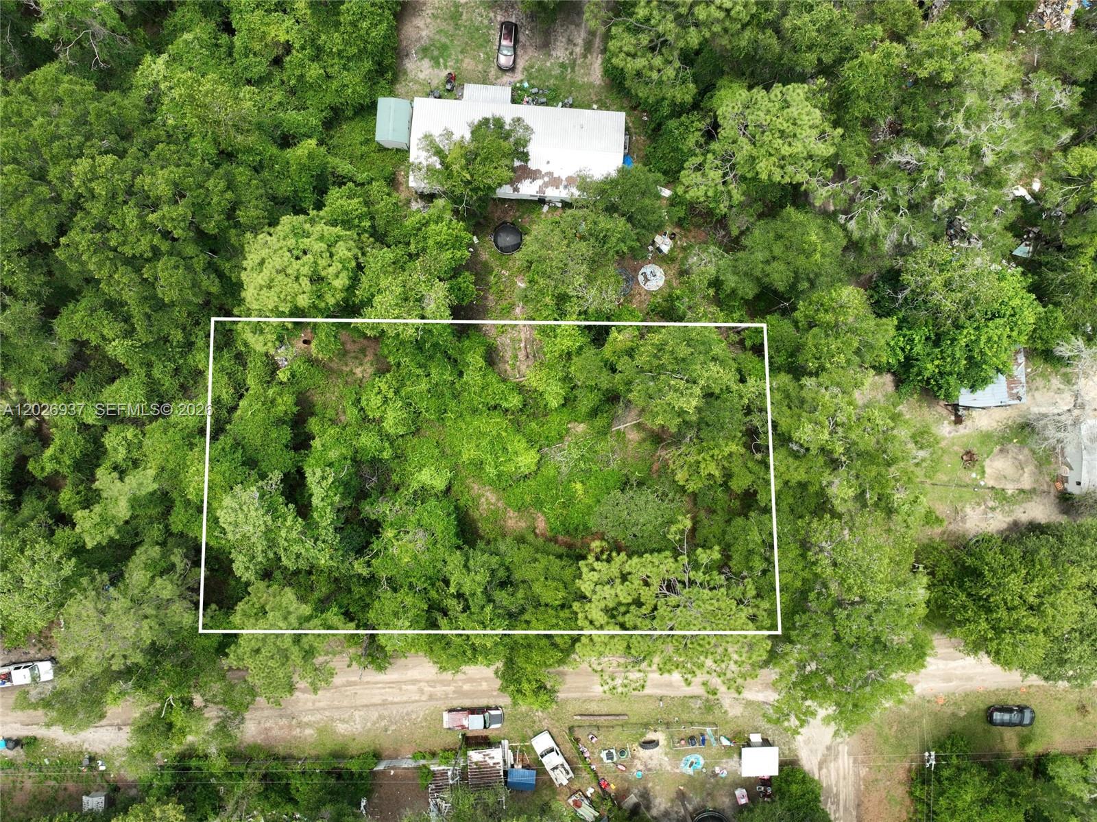 Build your dream home or weekend getaway on this vacant lot located in Trenton, FL, with PID: 18-10-14-0027-0007-0220. Situated in a quiet rural setting near the Suwannee River area, this property offers privacy, natural surroundings, and convenient access to outdoor recreation, fishing, boating, and nearby amenities. Utilities are commonly serviced by private well water and septic sewer systems rather than public utilities. Electric service may be available nearby; buyer to verify availability, zoning, flood zone, utility connections, and building requirements with Gilchrist County. Ideal opportunity for a site-built or manufactured home in North Central Florida.