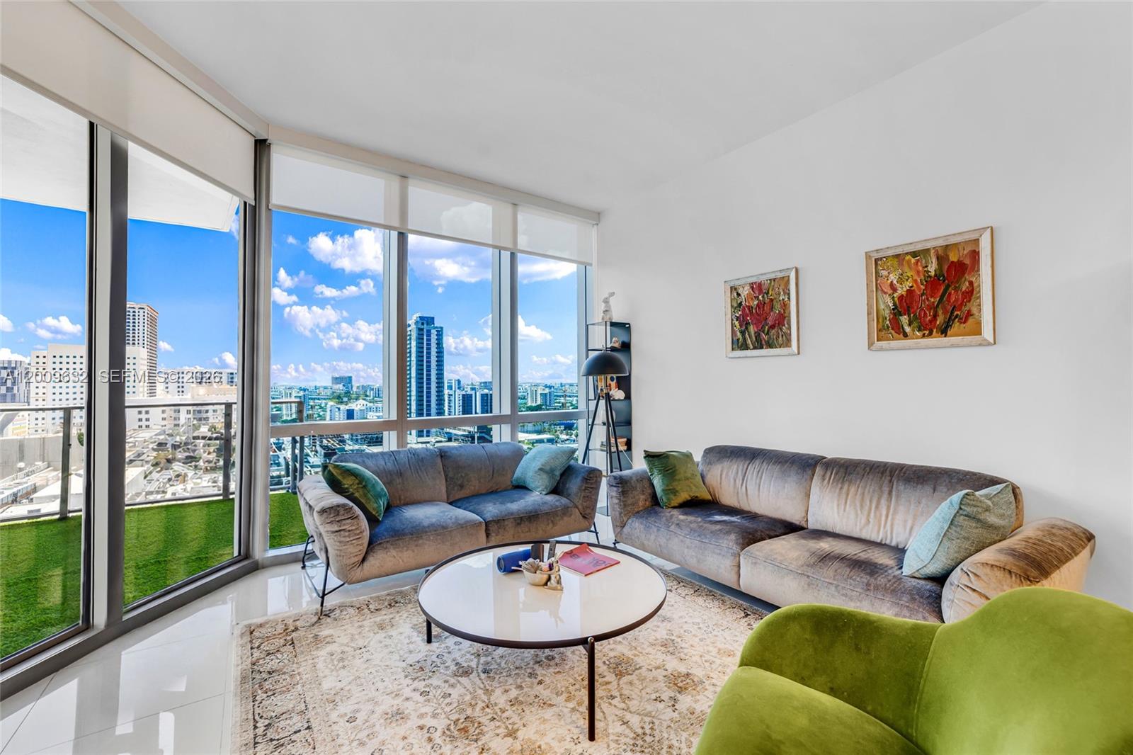 3 BEDROOM 3 BATHROOM Perfect location In Hard Downtown Miami World Center HIGH CEILINGS 10' WITH A FLOOR TO CEILING WINDOWS ITALIAN KITCHEN AND TOP OF THE LINE APPLIANCES BOSH MARBLE FLOOR. The unit has a private elevator, unbelievable sunset views, and a deep 16x12 large balcony. Most Amenities in the World include a basketball court, 5 pools, a Spa, a Gym with a boxing area, a BBQ kitchen, Virtual Golf, a Recording Studio, Racquetball, Yoga, Sunrise pool, & Kids Play Area. Skydeck, Observatory to view stars with telescopes, Tennis courts, and a Jacuzzi rooftop pool with 360 views of Miami. Great investment opportunity EASY TO SHOW. SELLER MOTIVATED