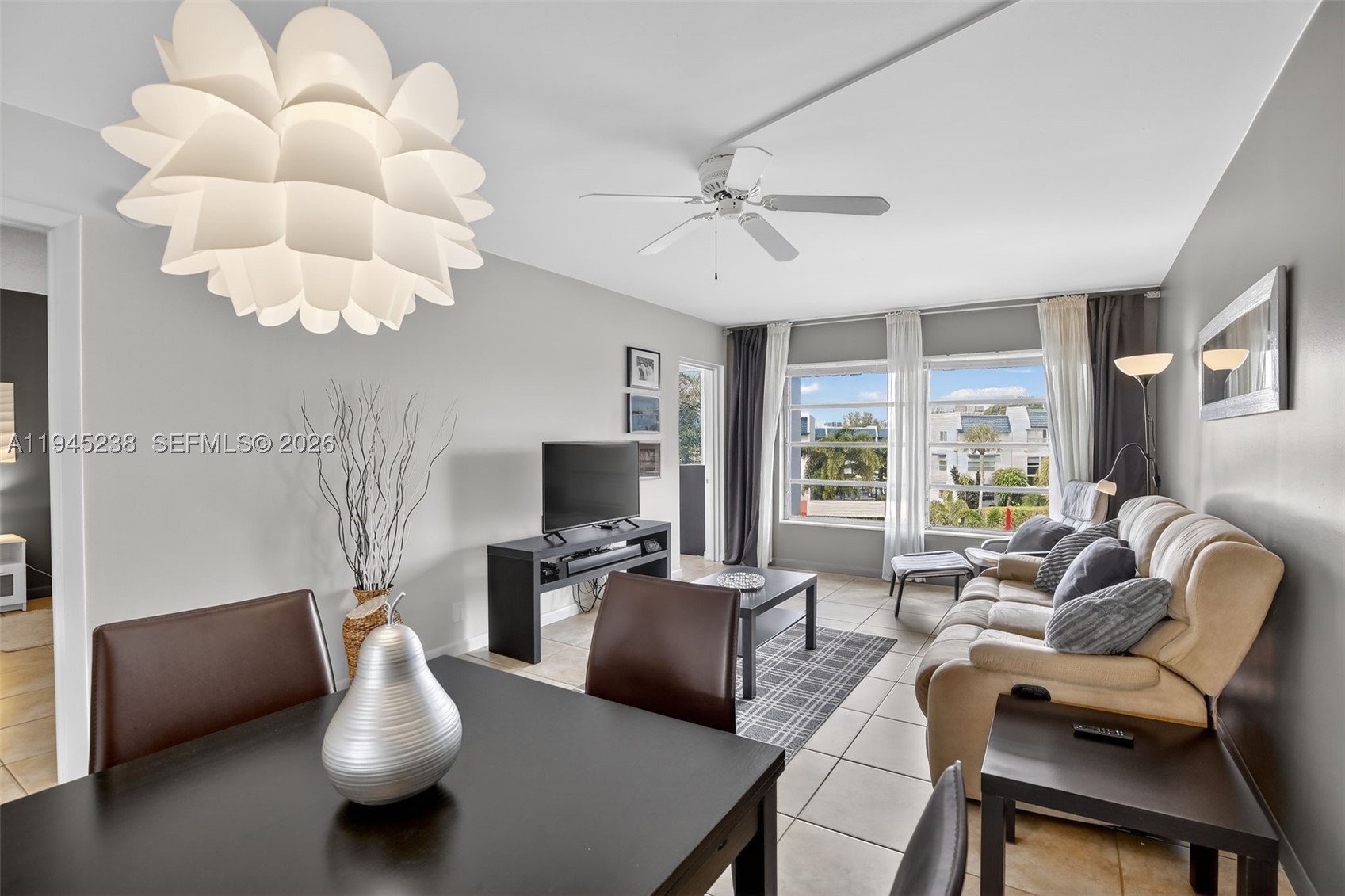 Beautiful condo with 1 bedroom and 1 bathroom in desirable Oriole Golf! Enjoy serene pool views from this bright third-floor unit with no neighbors above for added privacy and quiet. The Florida room or balcony is thoughtfully set up as a guest bedroom, offering flexible living space perfect for hosting visitors. Tile flooring runs throughout, and the home is being sold fully furnished and turnkey, ready for immediate enjoyment. The updated kitchen features white cabinetry and an attractive backsplash, creating a clean, inviting space. Tastefully decorated with attention to detail, this unit truly shows pride of ownership. Located in a HOPA-verified community, residents enjoy amenities including a pool, shuffleboard, outdoor grilling areas, and a gym. Cable and internet are included in the monthly fees.
AC (2015) and hot water heater (2022). An excellent opportunity for a full-time residence or seasonal retreat—this one is a must-see!