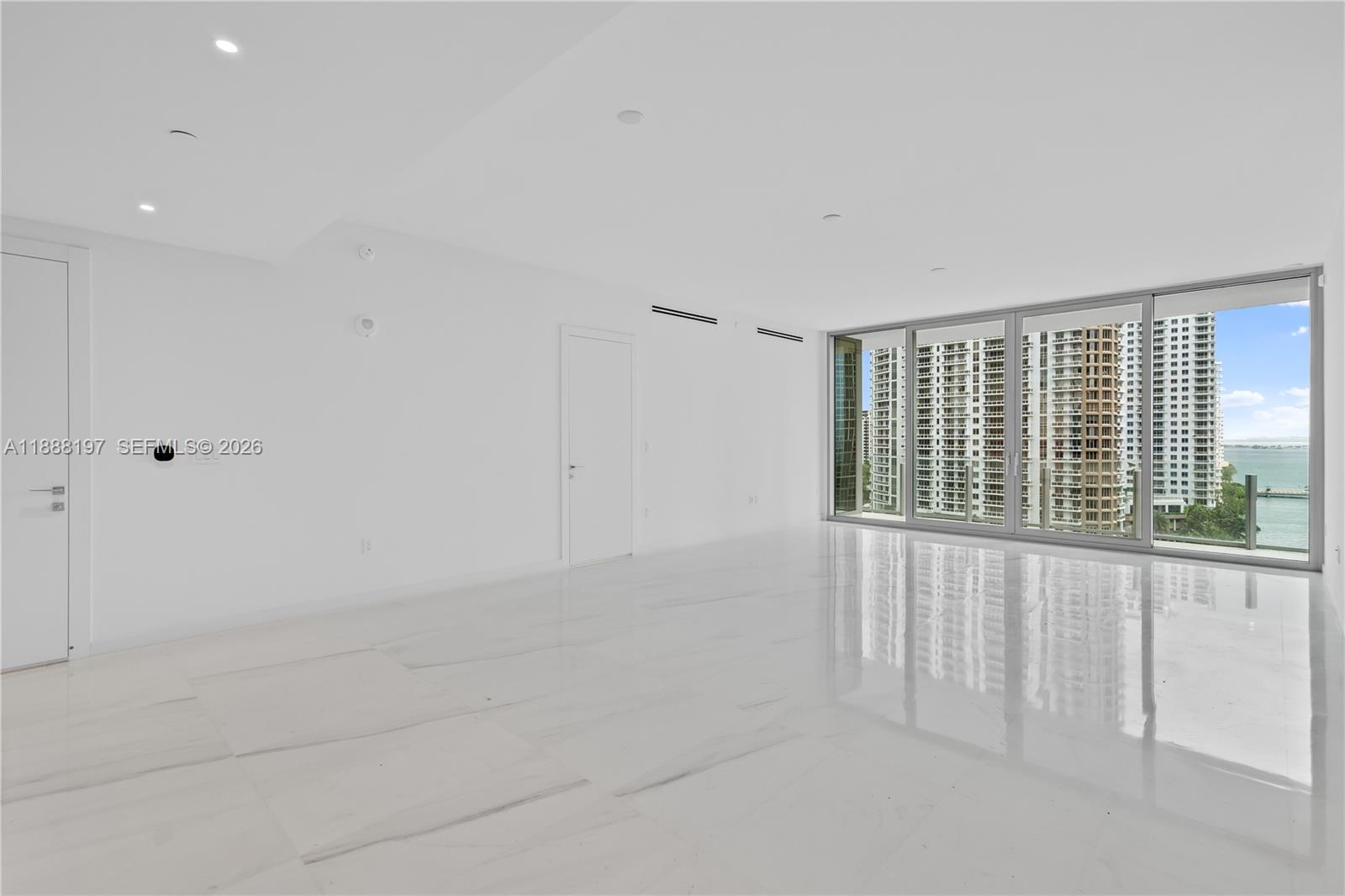 Welcome to the most special floor plan at the iconic Aston Martin Residences in Miami, where luxury meets unparalleled elegance. This stunning waterfront unit offers breathtaking views of Biscayne Bay, wit floor to ceiling windows that bathe the space in natural light. The residence boasts a sophisticated open floor plan, complete with high-end finishes, high ceilings, Bulthaup cabinetry, and state-of-the-art Gaggenau appliances. As resident, you'll enjoy access to 42,000 square feet of world class amenities, including a spa, fitness center, infinity pool, virtual golf room, and private screening room. Designed for those who appreciate the finer things in life, Aston Martin Residences provides a lifestyle of opulence and tranquility, with the vibrant energy of Miami just steps away.