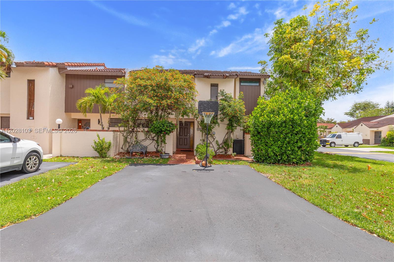Welcome to this charming 2-bedroom + den, 2.5-bath townhome nestled in a sought-after community. The open living space features beautiful laminate flooring throughout, while the updated kitchen shines with stainless steel appliances. A full-size washer and dryer are included for added convenience. Enjoy resort-style amenities right outside your door — including a pool, tennis court, and racquetball court. Whether you’re relaxing or staying active, this home has it all.