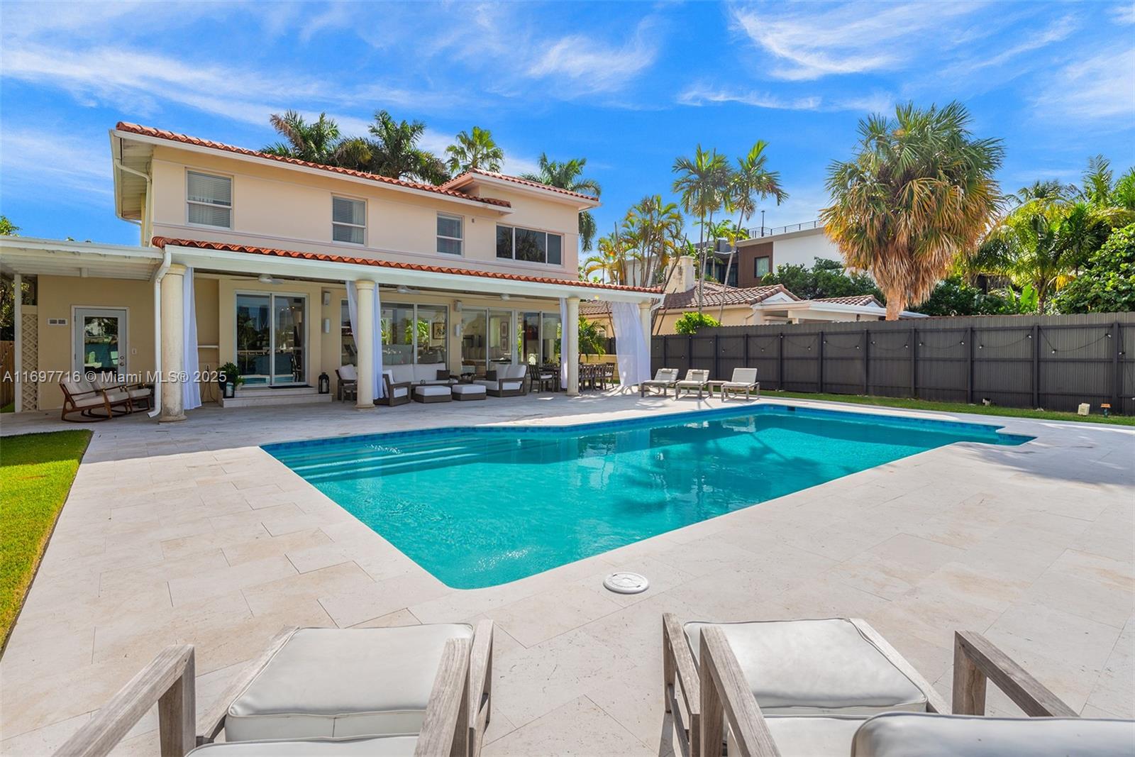 Experience luxury waterfront living on Miami Beach’s exclusive Venetian Islands. This prime waterfront property is perfectly positioned to capture breathtaking west-facing views
and stunning sunsets over the open water. With its timeless classic design, the 4-bed, 4.5-bath home boasts bright open floor plan with beautiful wood floors throughout. It is sited
on a lush, 10,500-SF lot with 60-FT of waterfrontage and a newer seawall, ideal for boating enthusiasts. Enjoy outdoor living, dining, and lounging by your private pool and covered
patio. Complete with a 2-car garage for comfort - this home is nestled in the heart of Miami Beach, providing easy access to the vibrant Sunset Harbour neighborhood, world-famous
South Beach, and all cultural offerings of Miami. Own a slice of paradise.