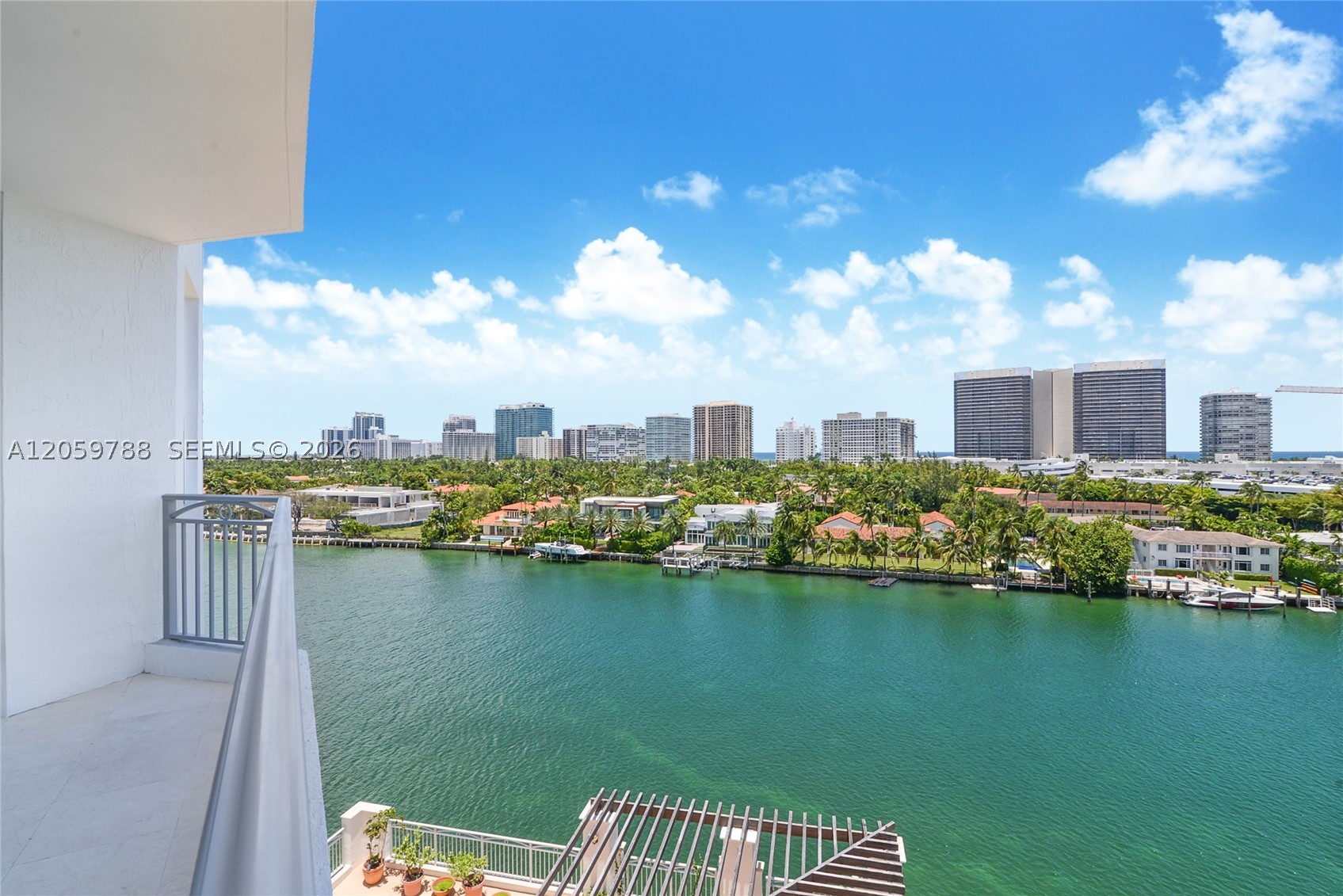 Experience luxury living in one of the area's most sought-after buildings, offering breathtaking views of the Intracoastal Waterway, the Atlantic Ocean, and the sparkling city skyline. This beautifully appointed 3-bedroom, 2.5-bath residence features an open-concept kitchen, elegant marble flooring, and an abundance of natural light throughout. Enjoy both sunrise and sunset from two private balconies facing east and west, creating the perfect setting for relaxing or entertaining. Ideally located just steps from the world-renowned Bal Harbour Shops, pristine beaches, fine dining, and charming cafés, this home offers an exceptional lifestyle in one of South Florida's most desirable neighborhoods. Families will also appreciate its proximity to the highly rated Ruth K. Broad Bay Harbor K-8 School, one of Florida's top-performing public schools. Whether you're searching for a primary residence, a vacation retreat, or a sound investment, this exceptional property combines luxury, location, and long-term value in a truly prestigious community.